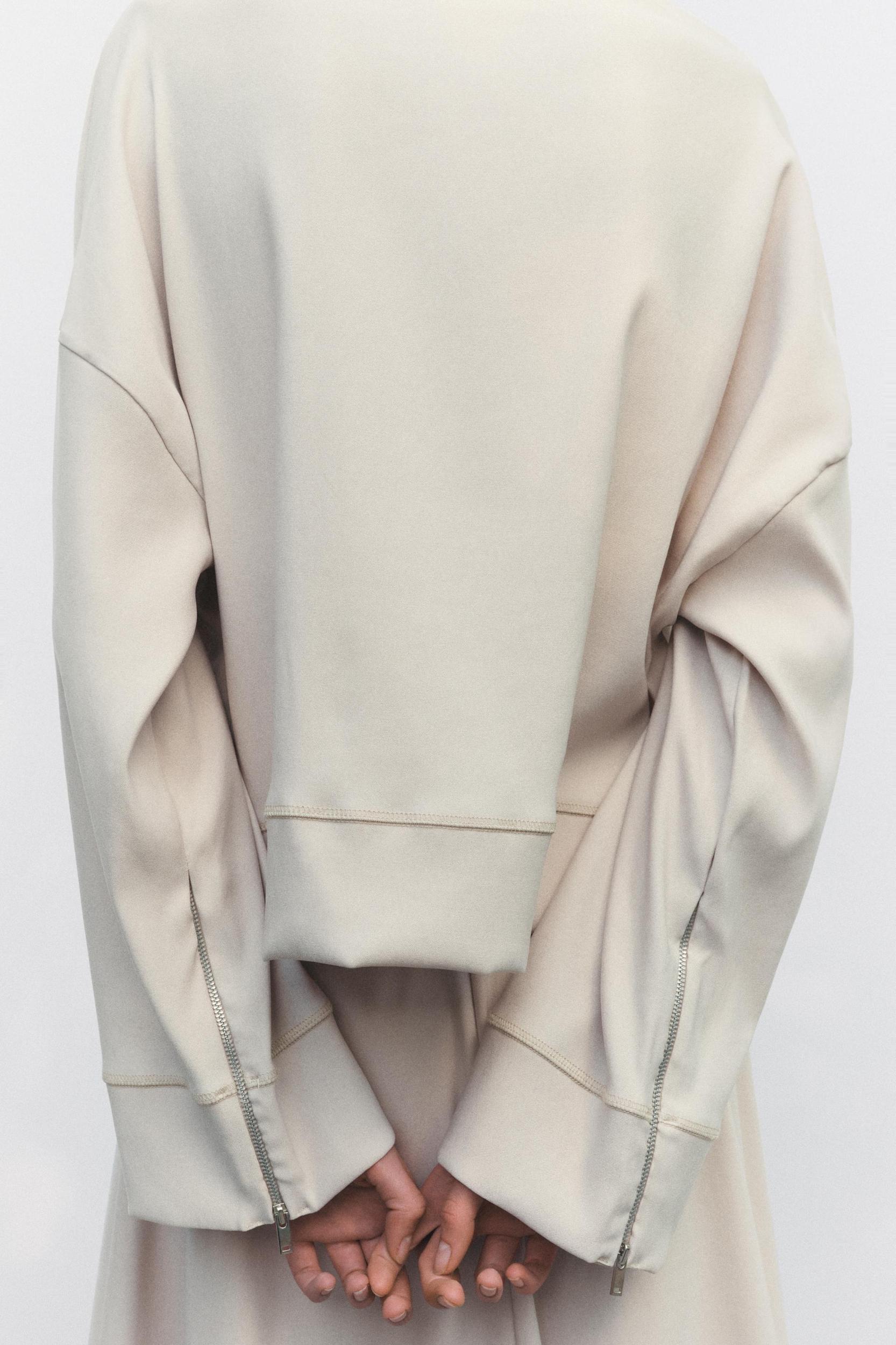 ZIPPERED VOLUMINOUS TOP Product Image