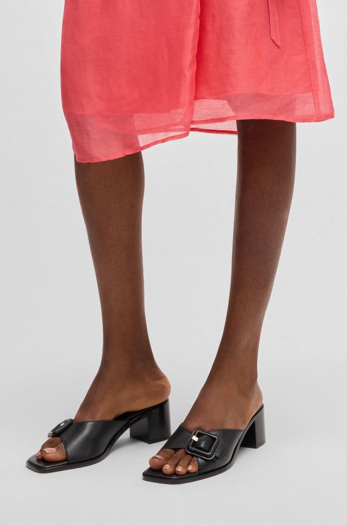 Leather mules with buckle detail Product Image