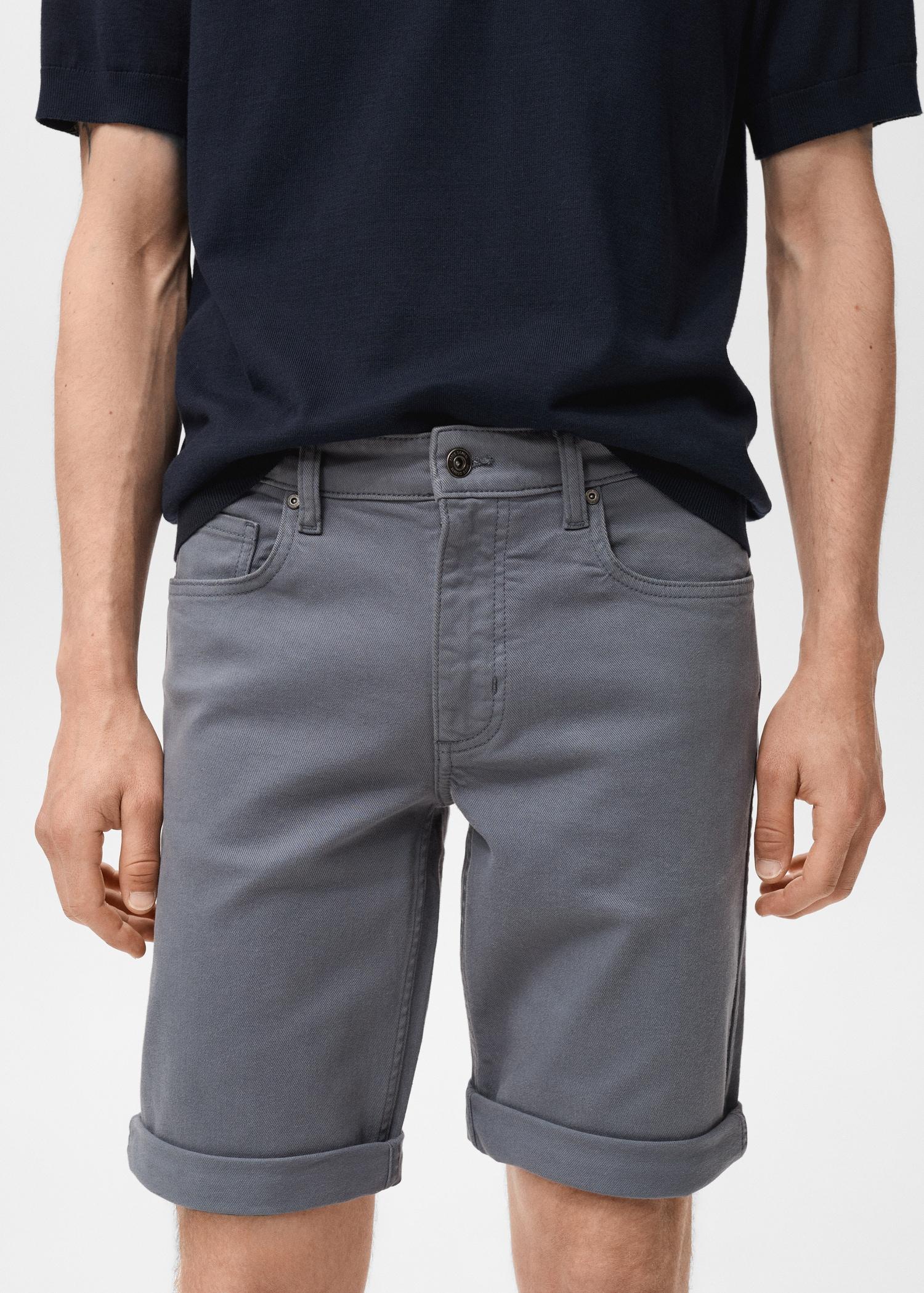 Slim-fit denim bermuda shorts - Men | MANGO USA Product Image