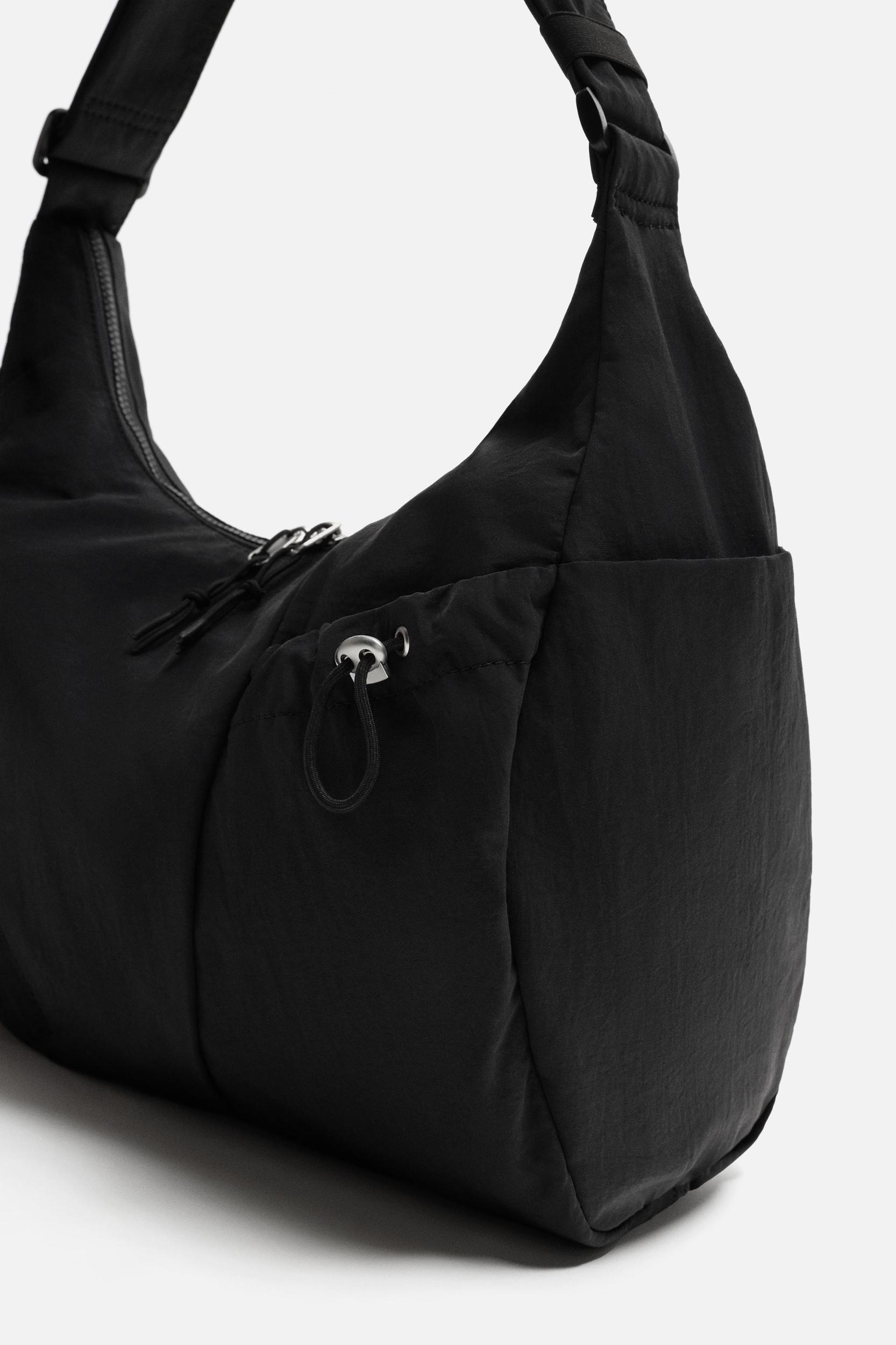 MULTI-POCKET TECHNICAL BAG Product Image