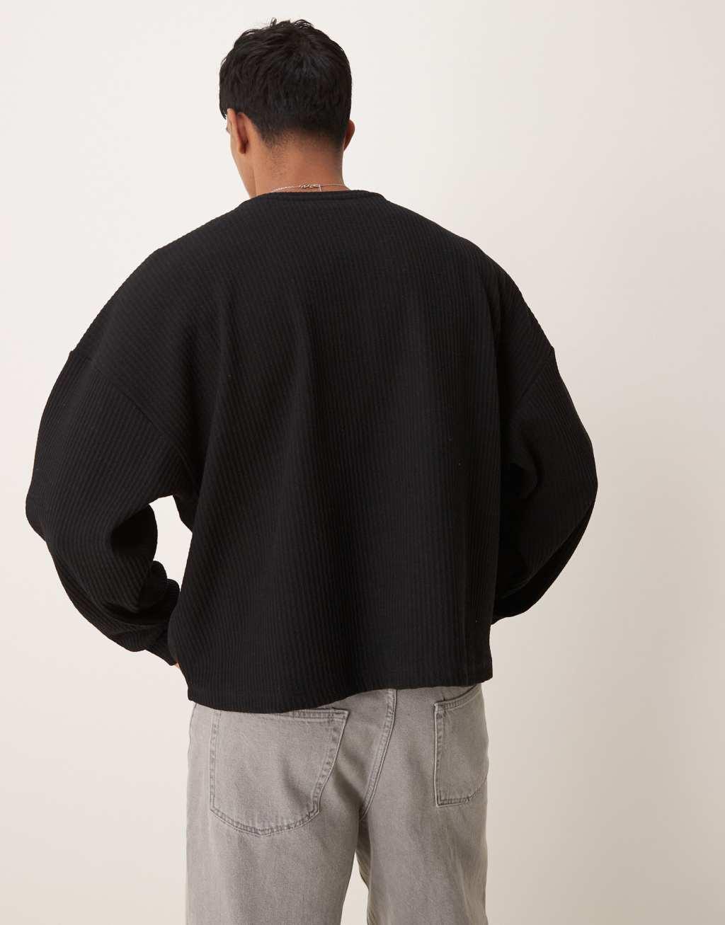 ASOS DESIGN extreme oversized boxy lightweight sweater with rib texture in black Product Image