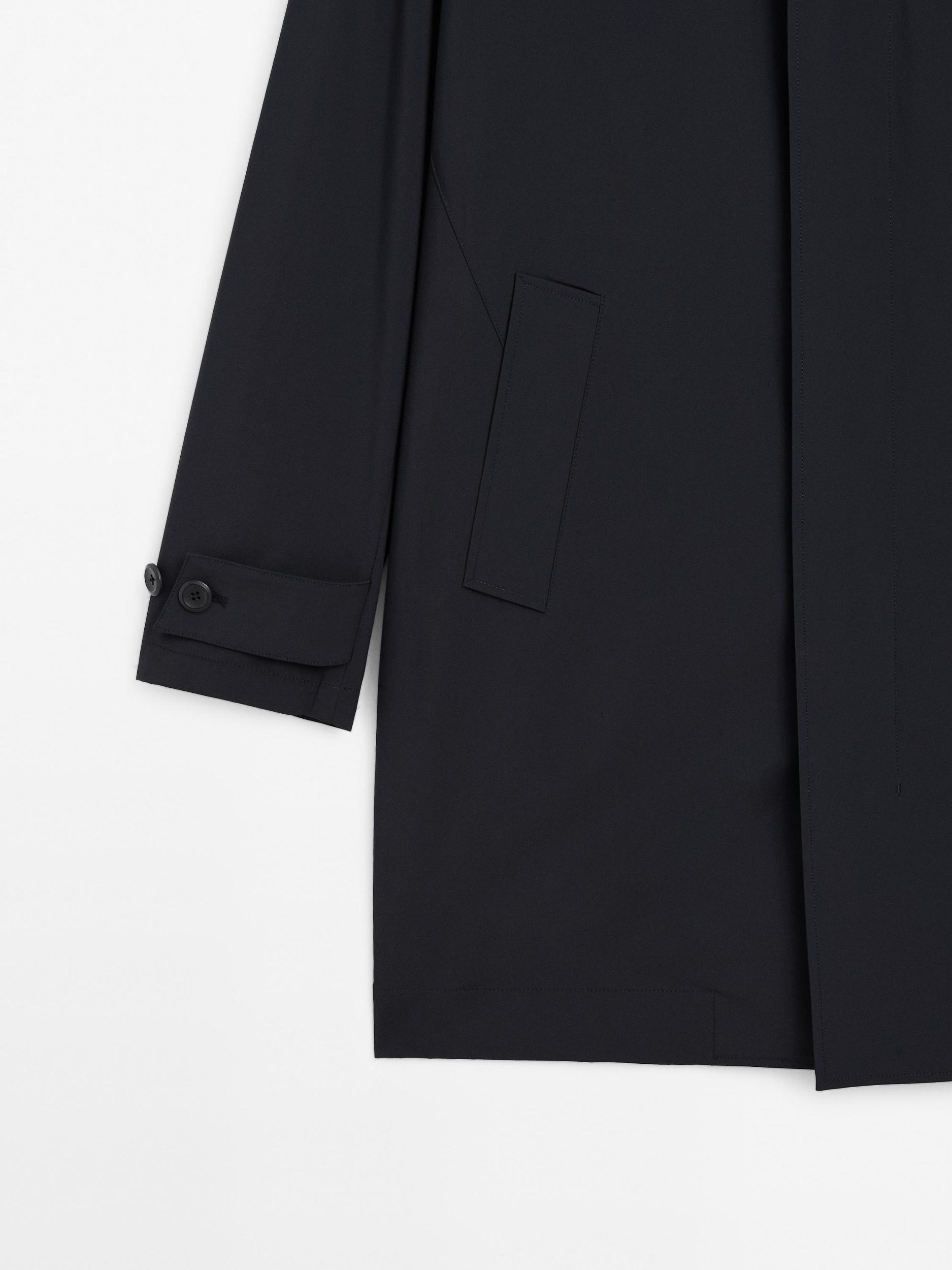 Lightweight trench coat with hidden buttons Product Image