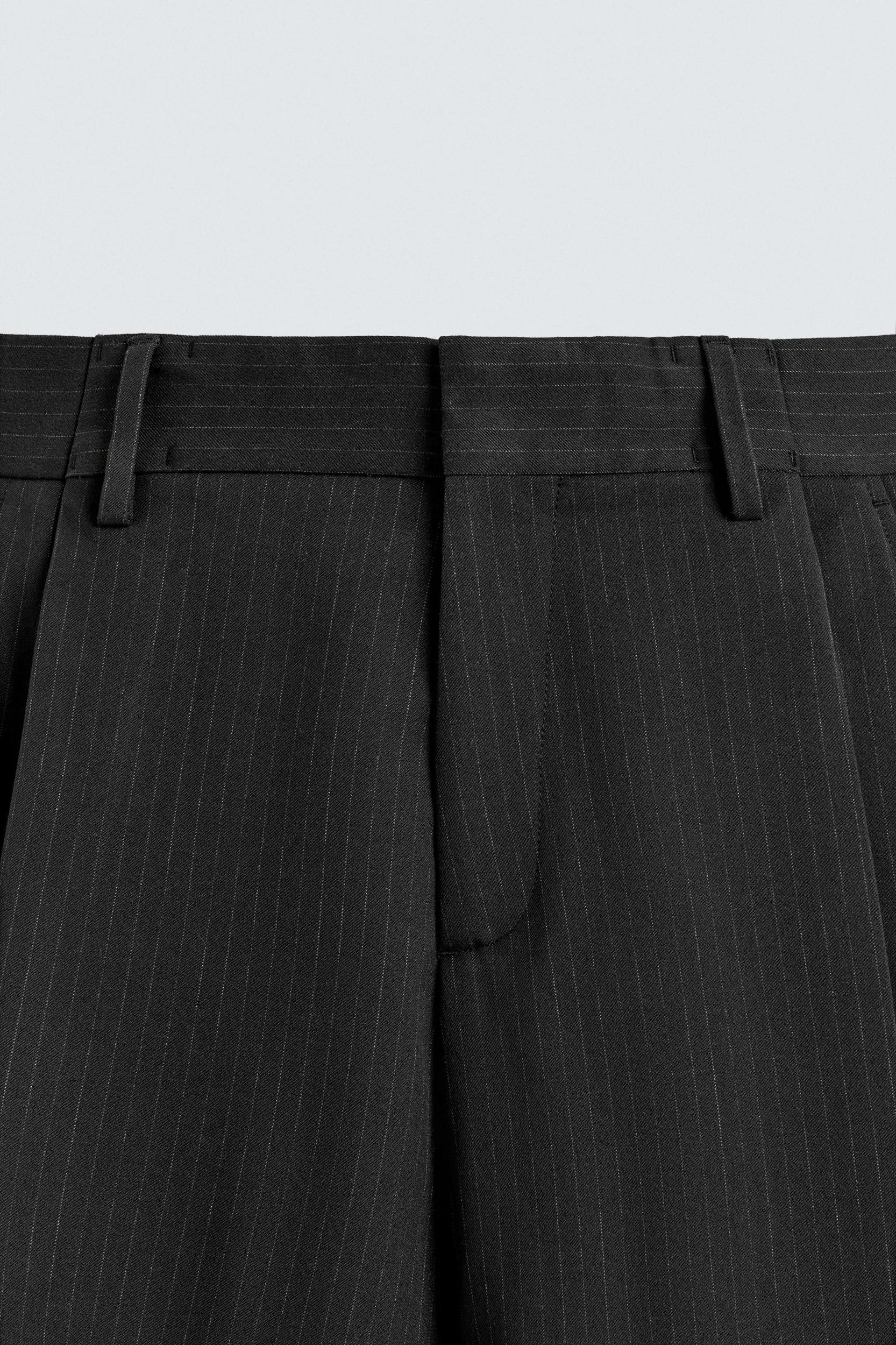PLEATED WIDE FIT PANTS Product Image