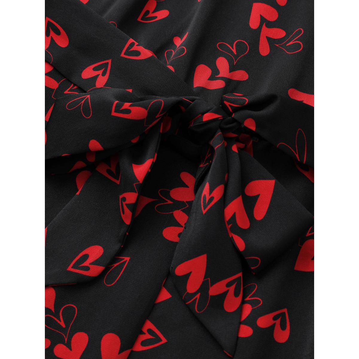 Plus Size Black Heart Print Pocket Belted Jumpsuit Women Elegant Short sleeve V-neck Everyday Loose Jumpsuits BloomChic 22-24/3X Product Image