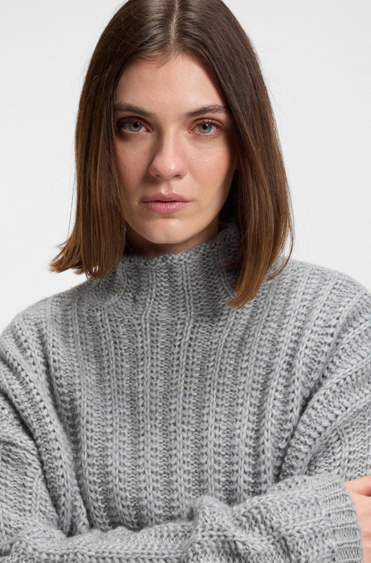 Knitted sweater with ribbed structure Product Image