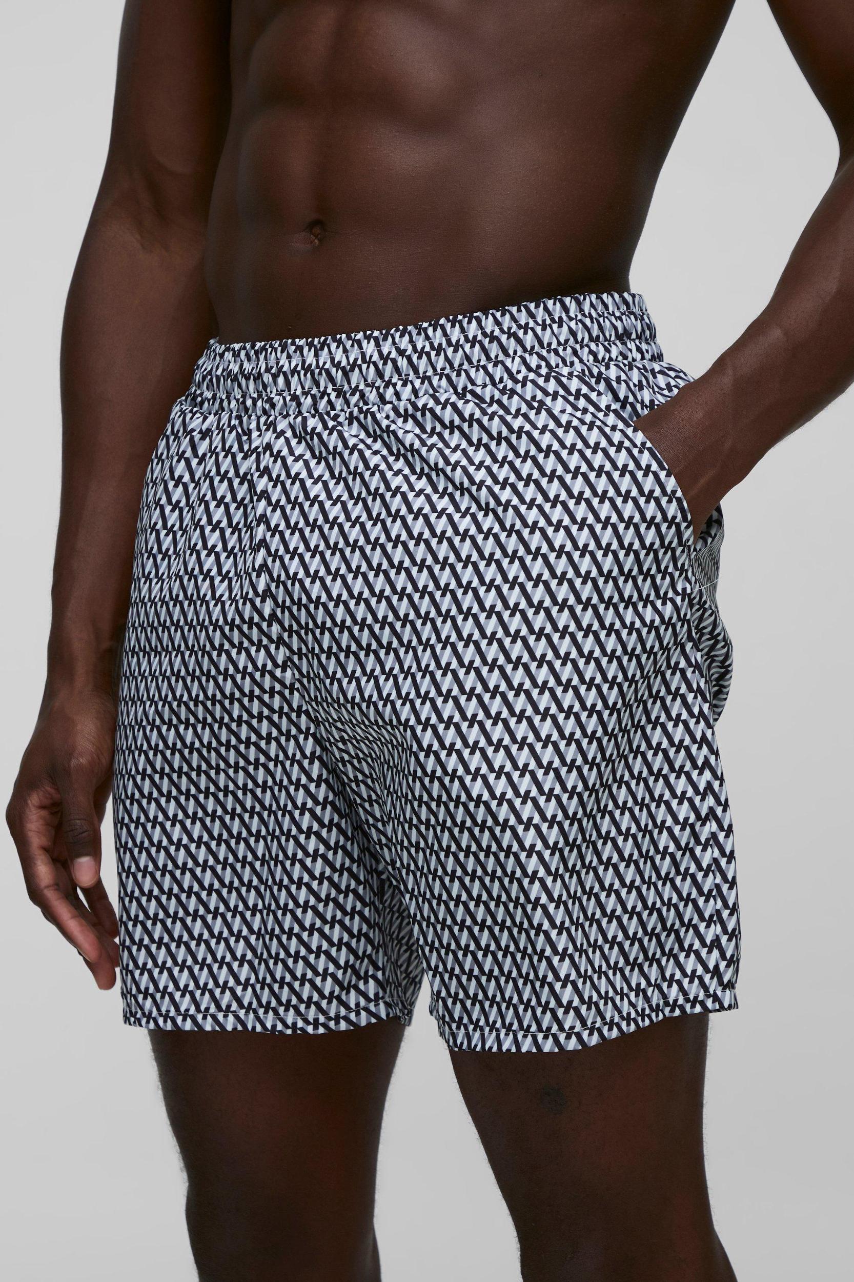 Abstract Printed Mid Length Swim Short | boohooMAN USA Product Image