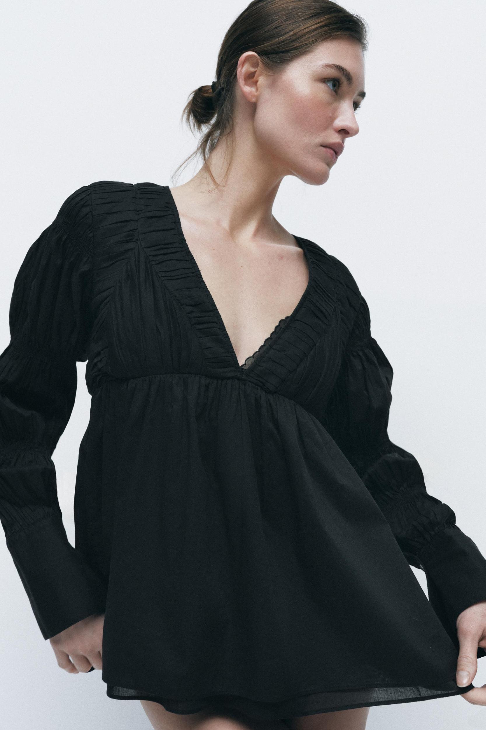 PLEATED ELASTIC BLOUSE Product Image