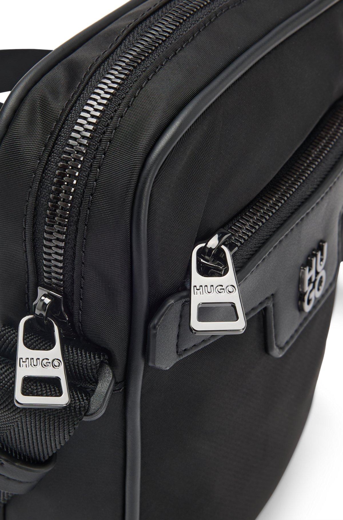 Reporter bag in structured twill with metallic stacked logo Product Image