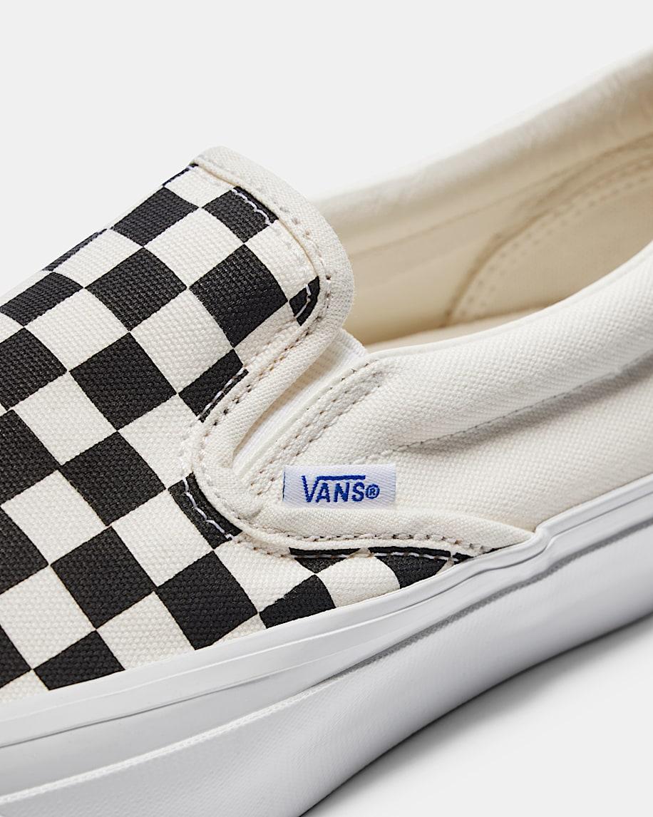 Premium Classic Slip-On Checkerboard Shoe in Checkerboard Black / Off White| Vans US Product Image