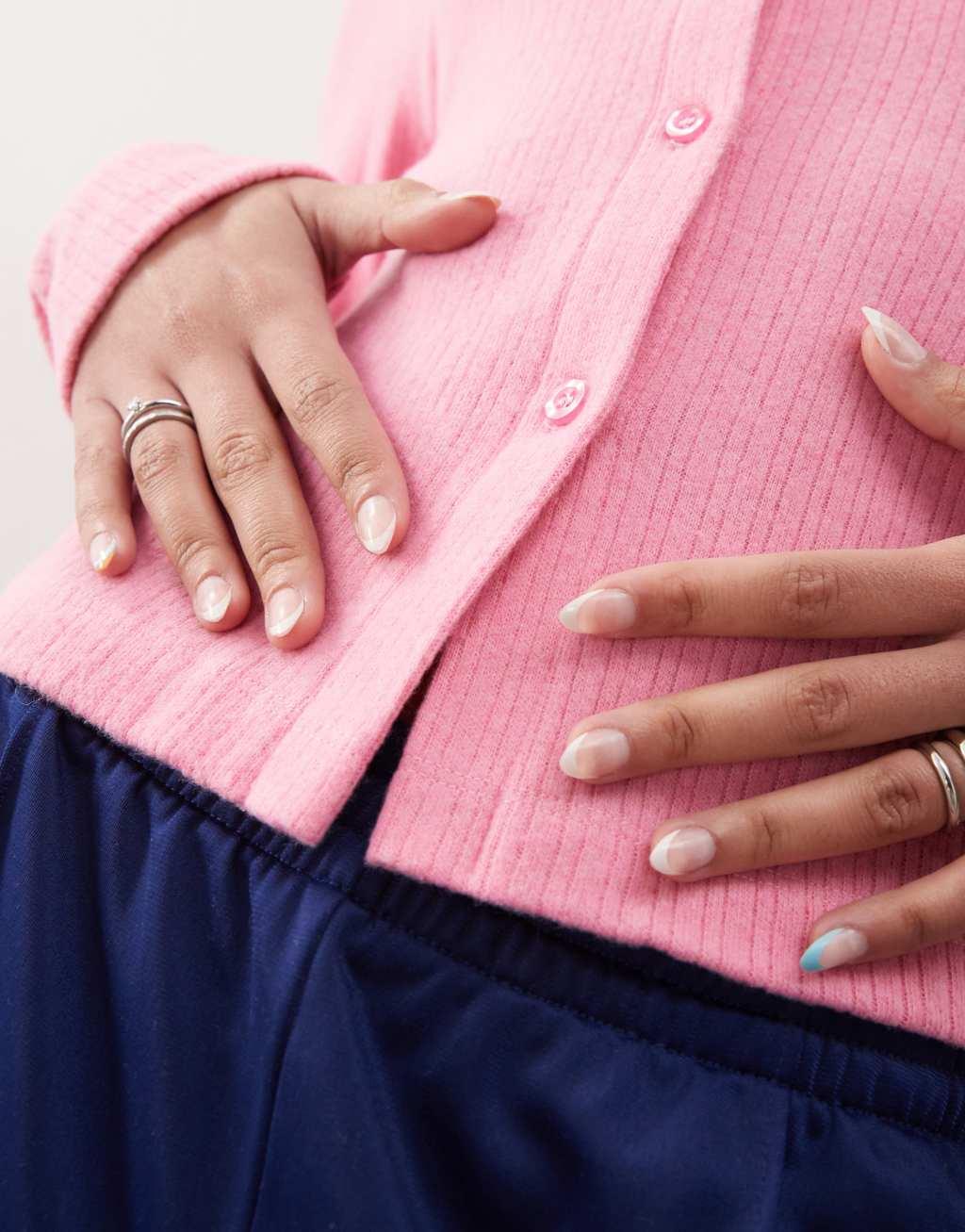 Reclaimed Vintage ribbed button up cardigan in pink Product Image