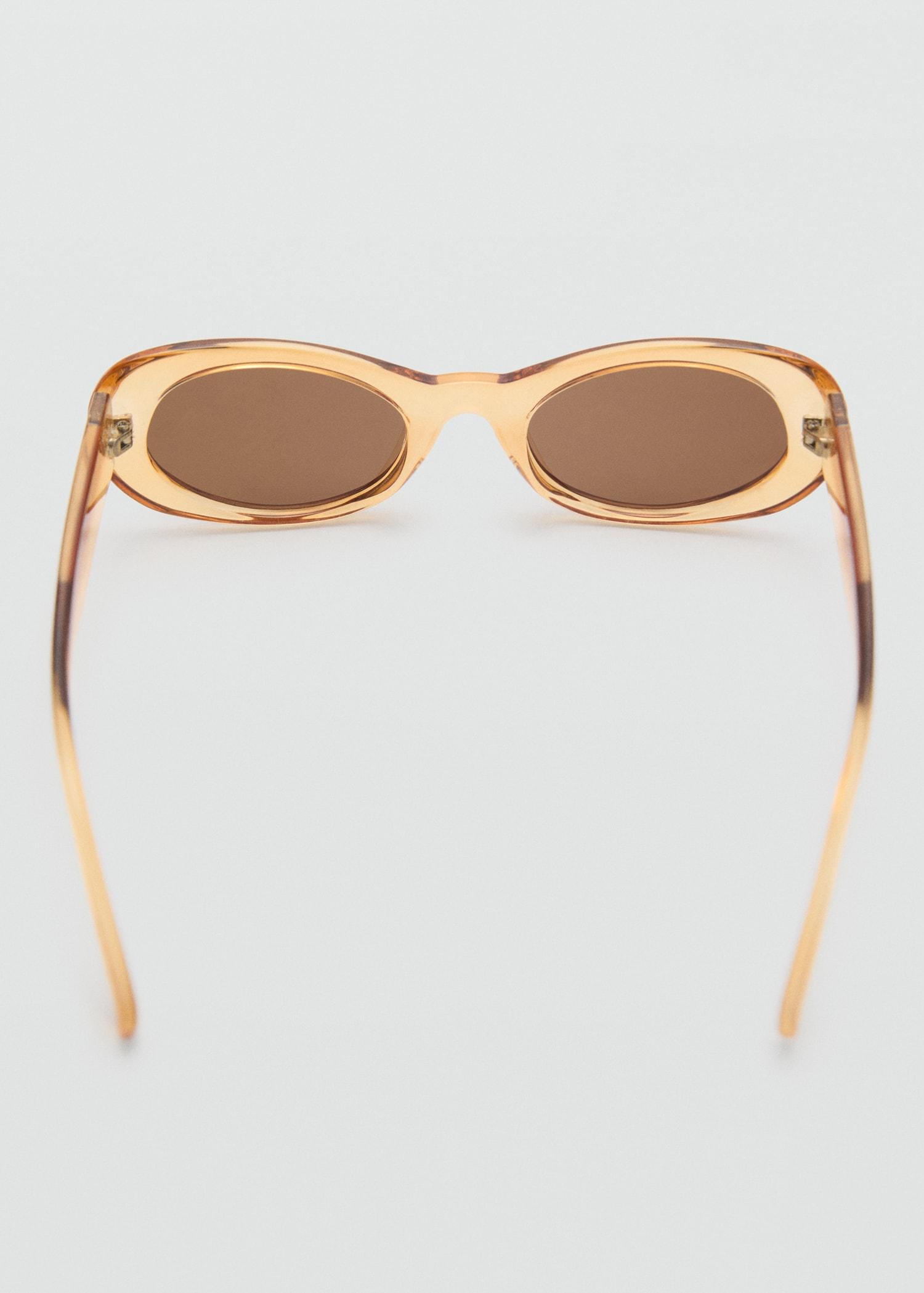 Oval-frame sunglasses - Women | MANGO USA Product Image