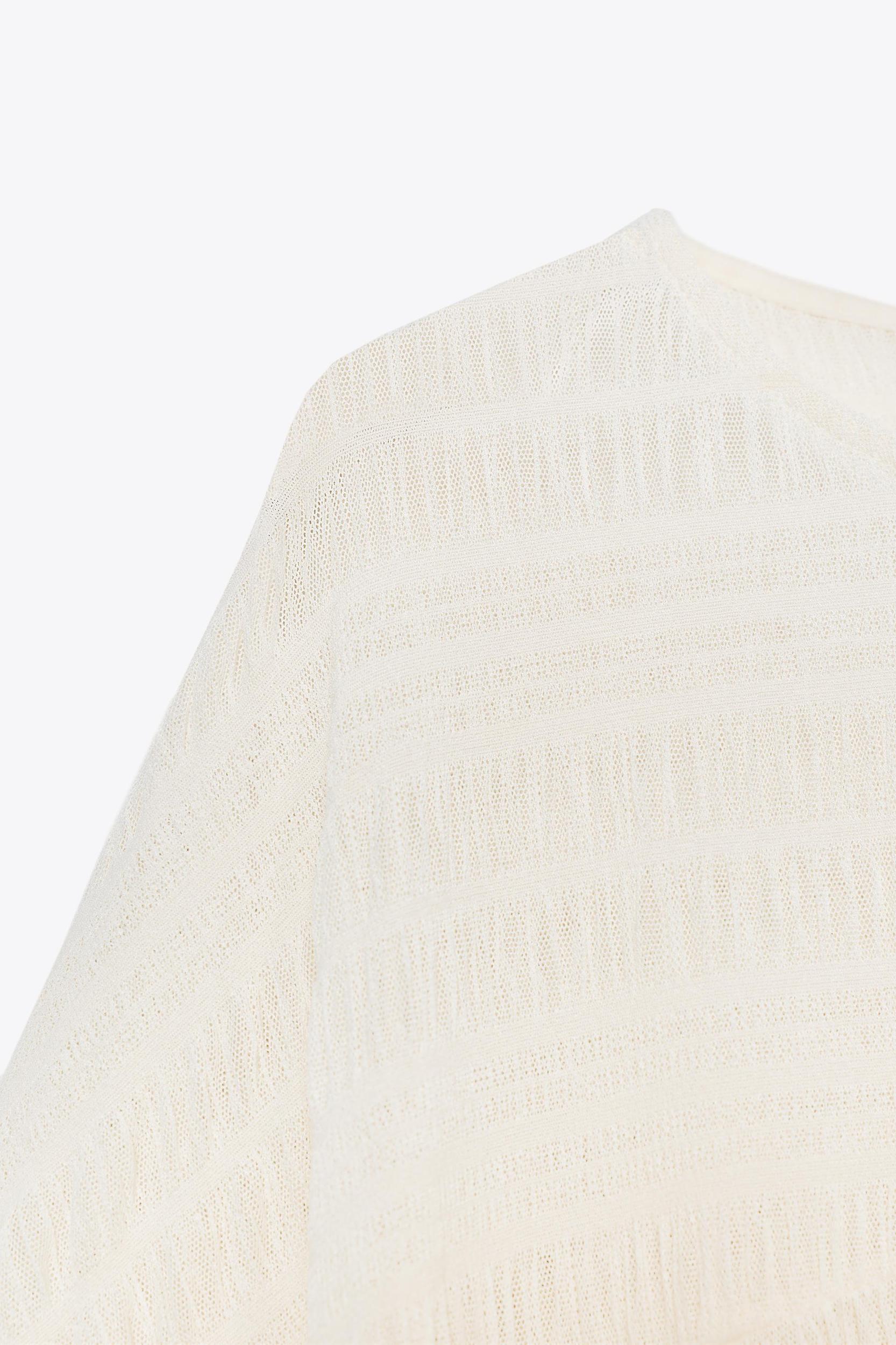 ASYMMETRIC TEXTURED CAPE Product Image