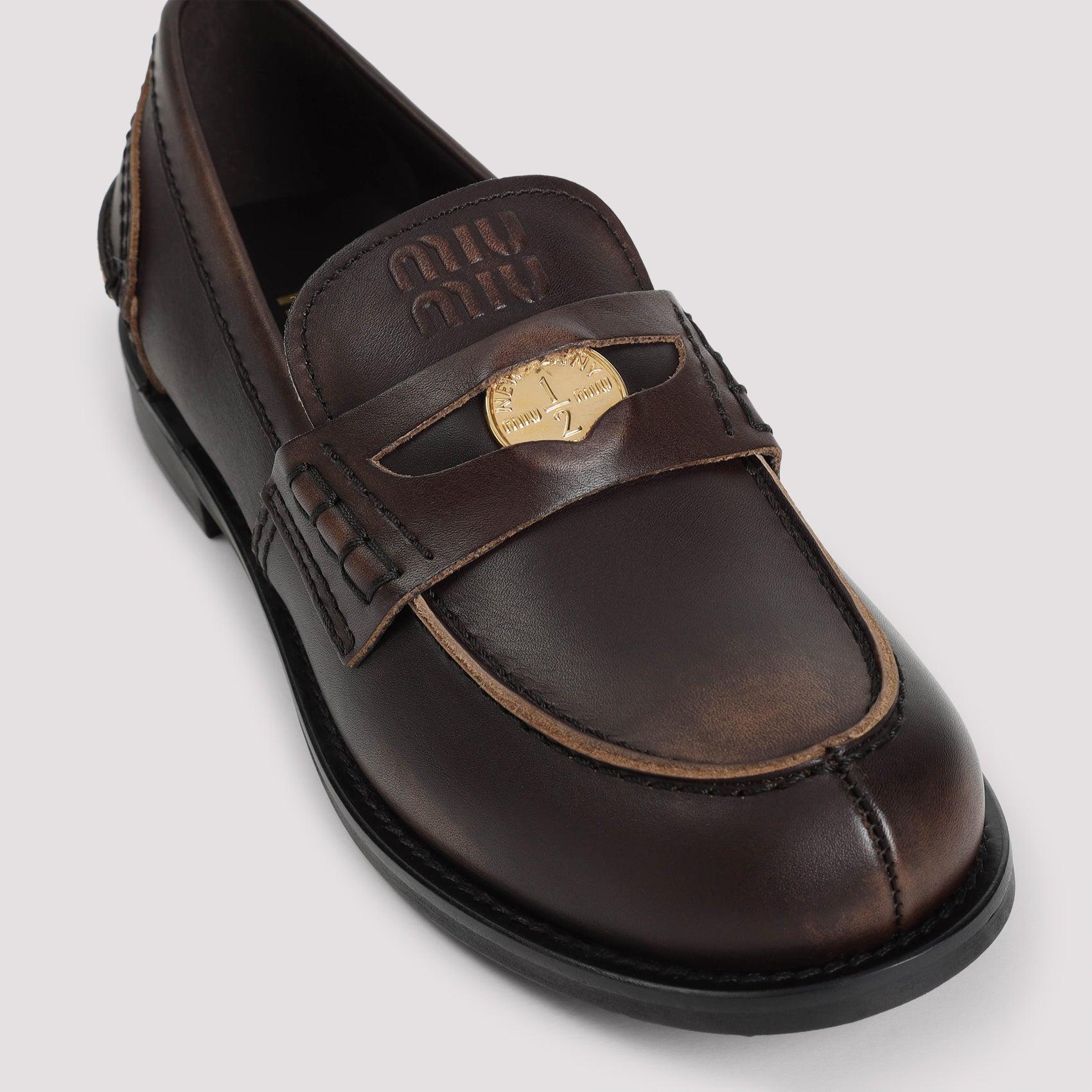 MIU MIU Leather Distressed Penny Loafers In Brown Product Image
