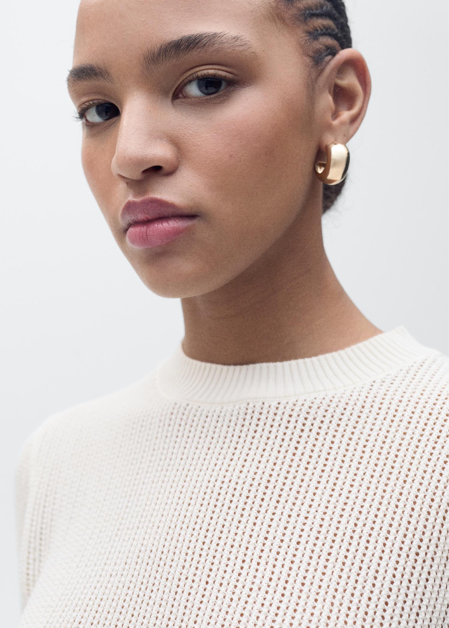 Short-sleeved openwork knitted sweater - Women | MANGO USA Product Image