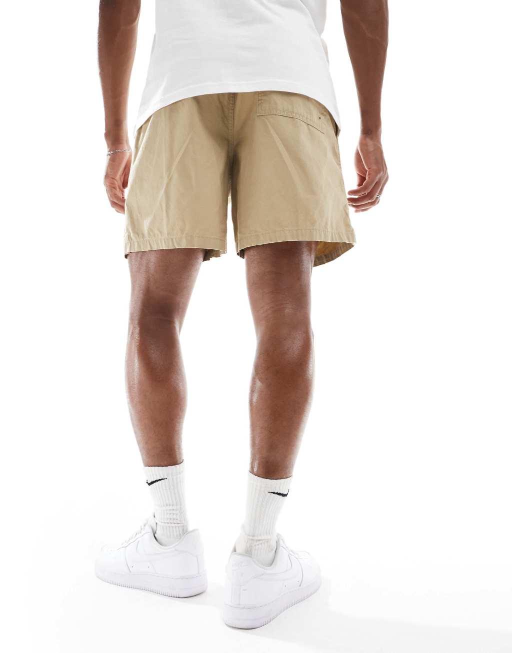 Nike Club woven shorts in beige Product Image