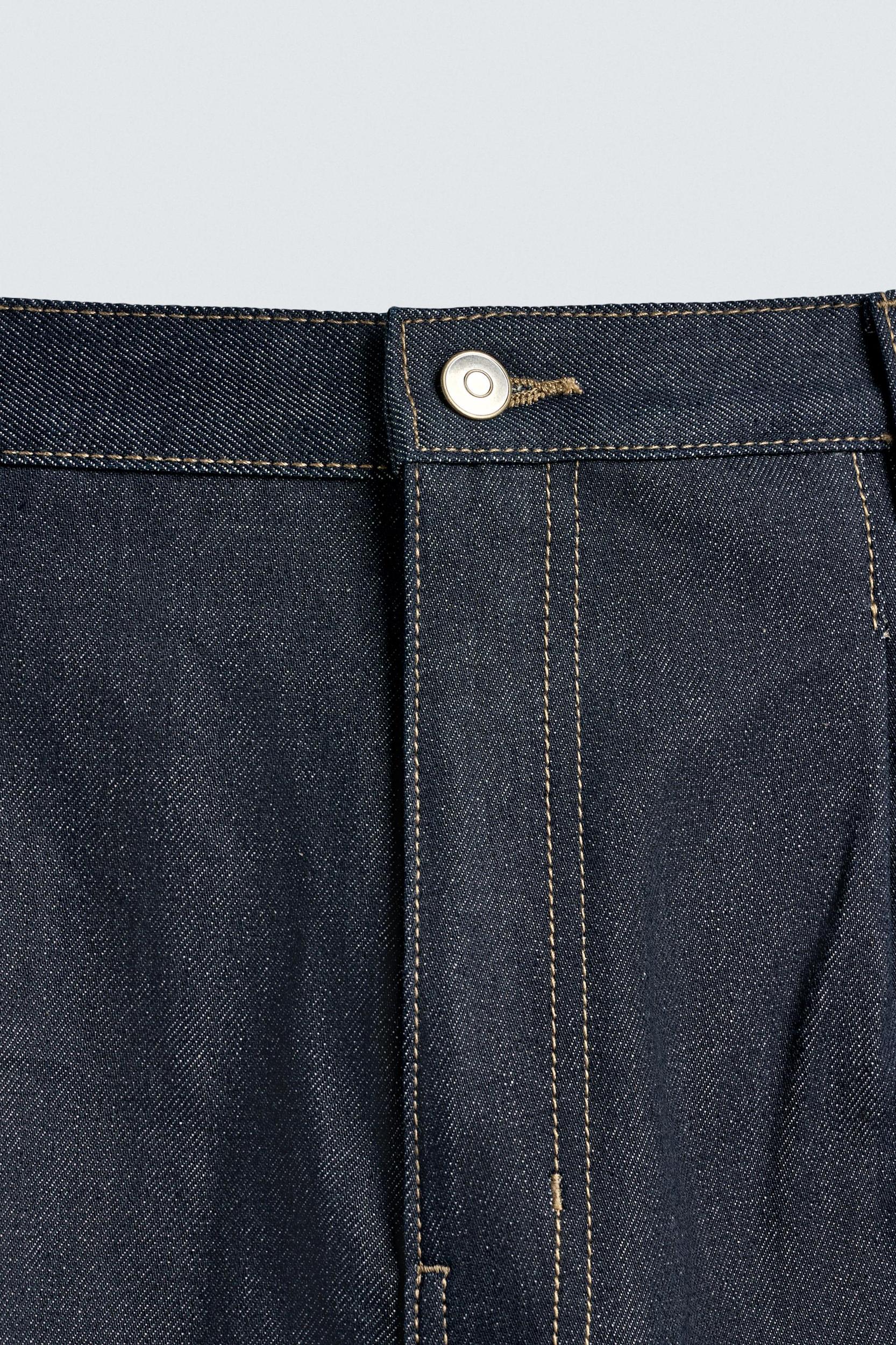 RELAXED FIT PLEATED DENIM SHORTS Product Image