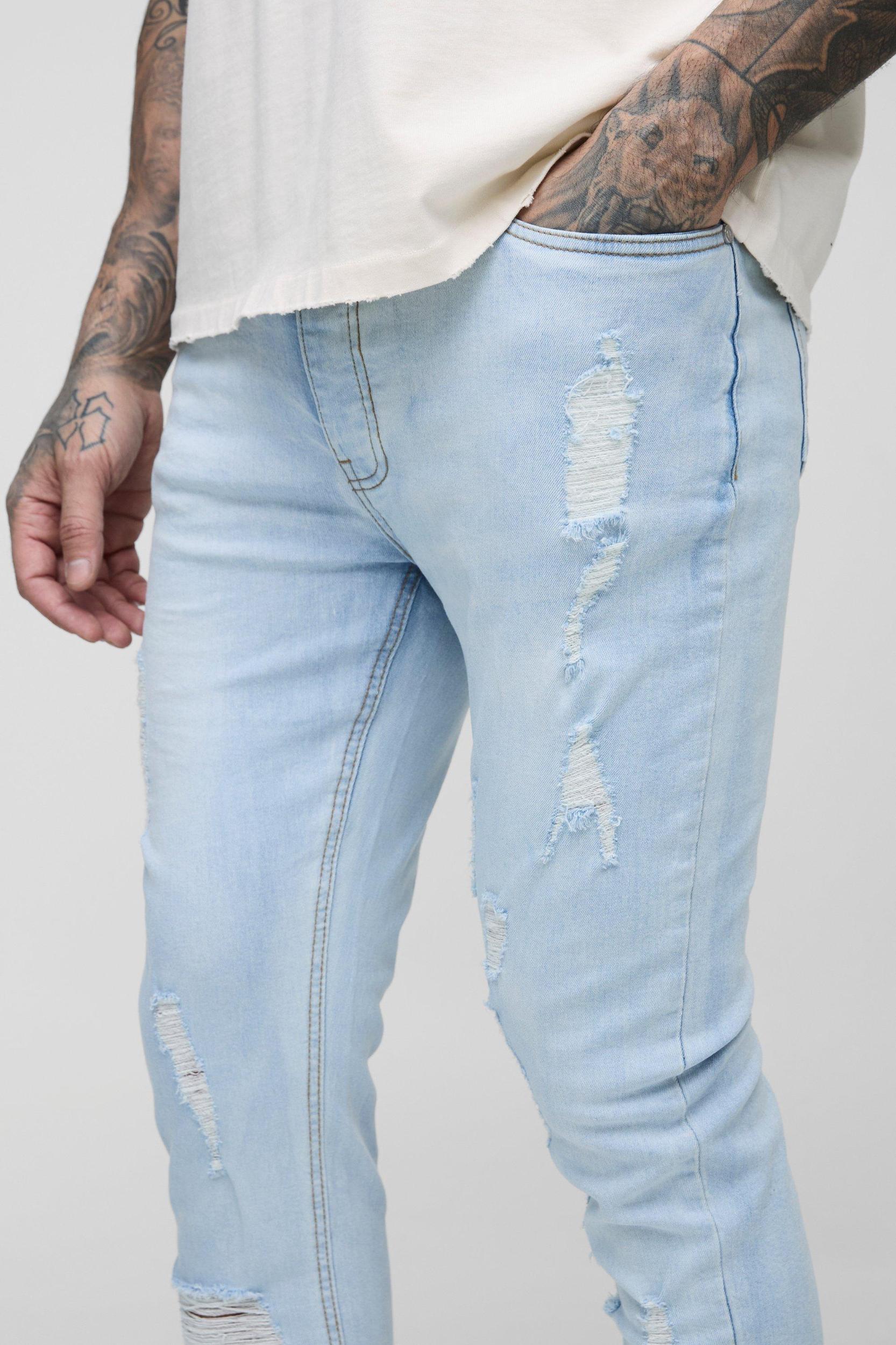 Tall Skinny Stretch Ripped Bleach Wash Jean | boohooMAN USA Product Image