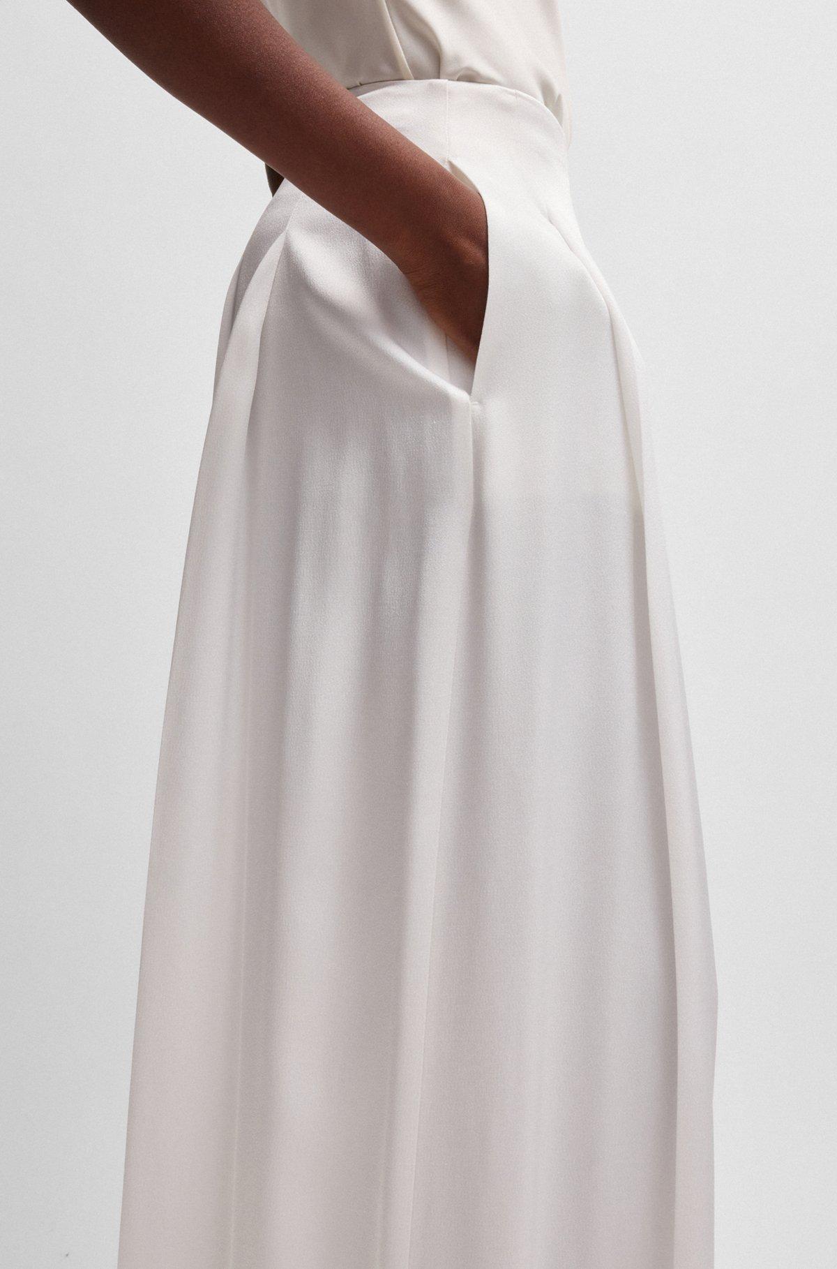 Relaxed-fit trousers with front pleats Product Image