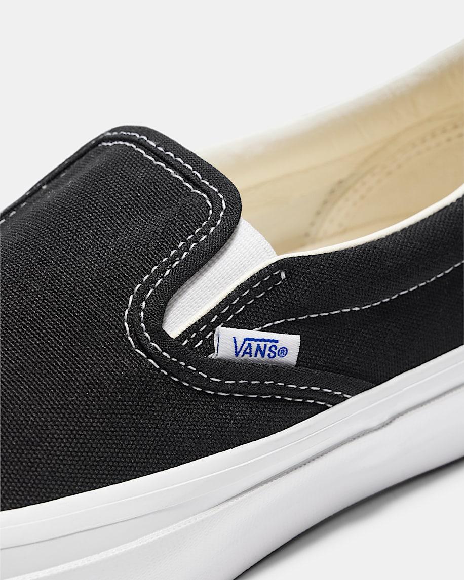 Premium Classic Slip-On Shoe in Black / White| Vans US Product Image