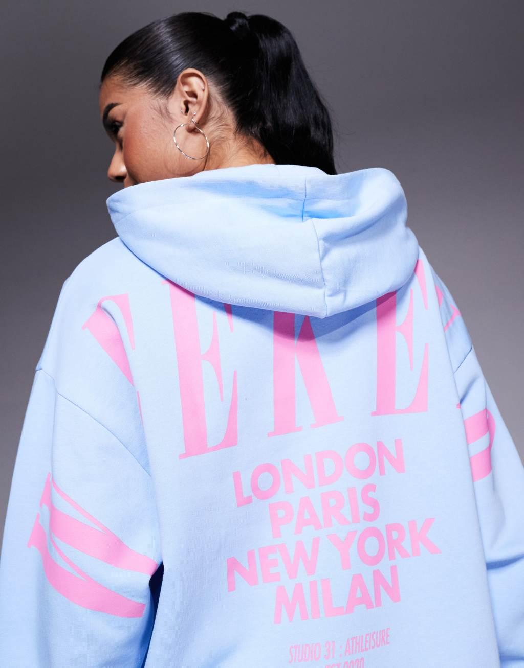 Weekend Collective oversized hoodie with pink stacked back logo in blue Product Image