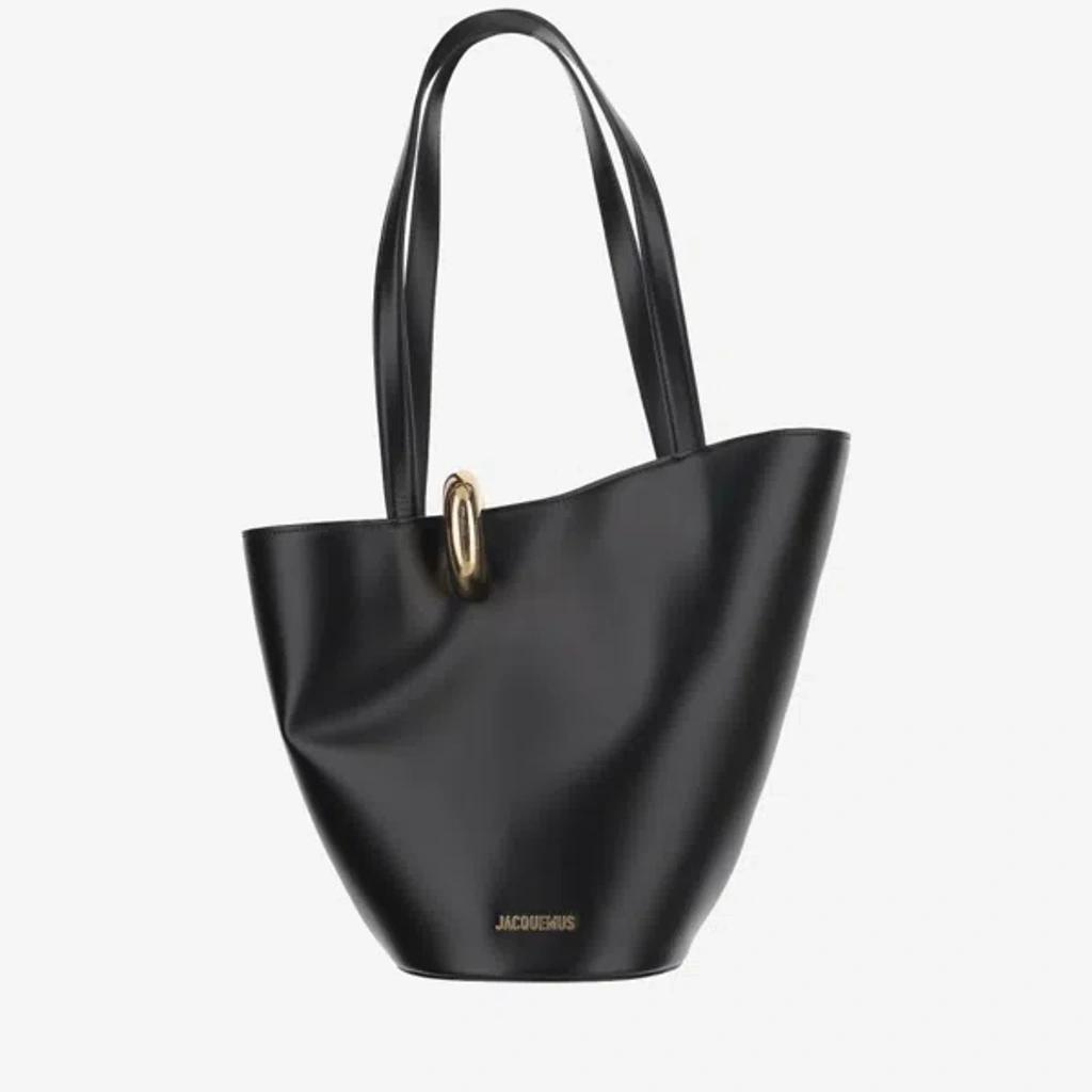 JACQUEMUS The Medium Bambola Asymmetric Leather Bucket Bag In Black 990 Product Image