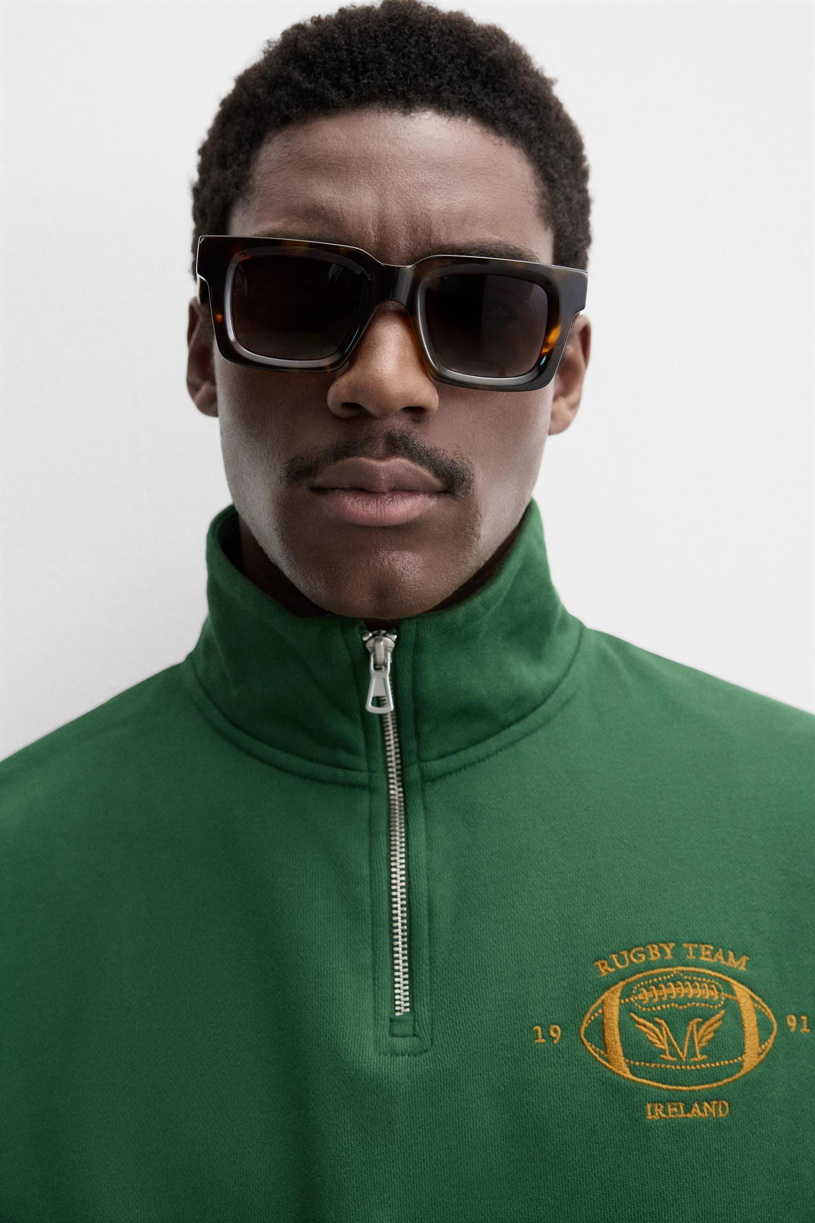 EMBROIDERED QUARTER-ZIP SWEATSHIRT Product Image