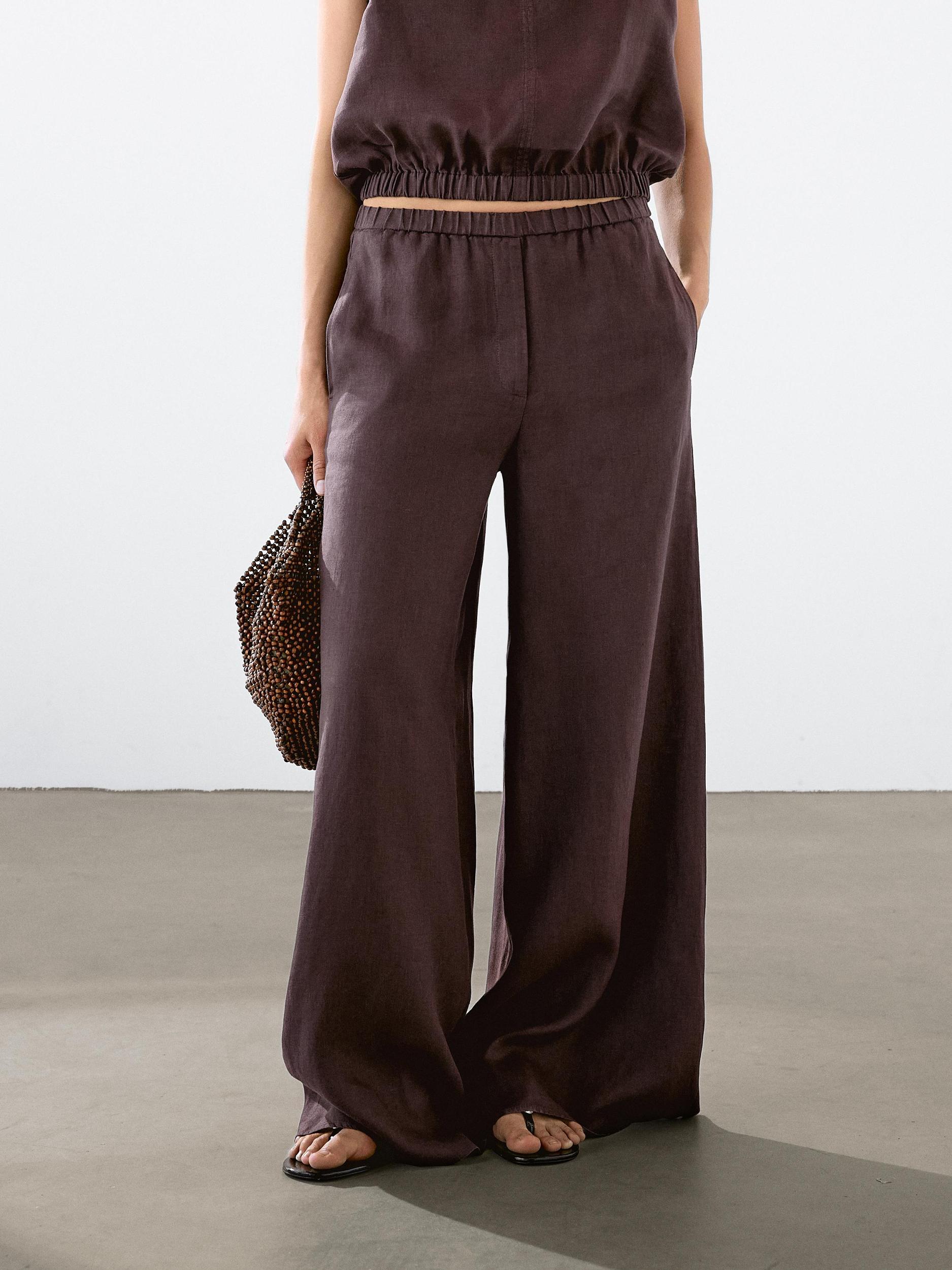 Straight-fit linen trousers with an elasticated waistband Product Image