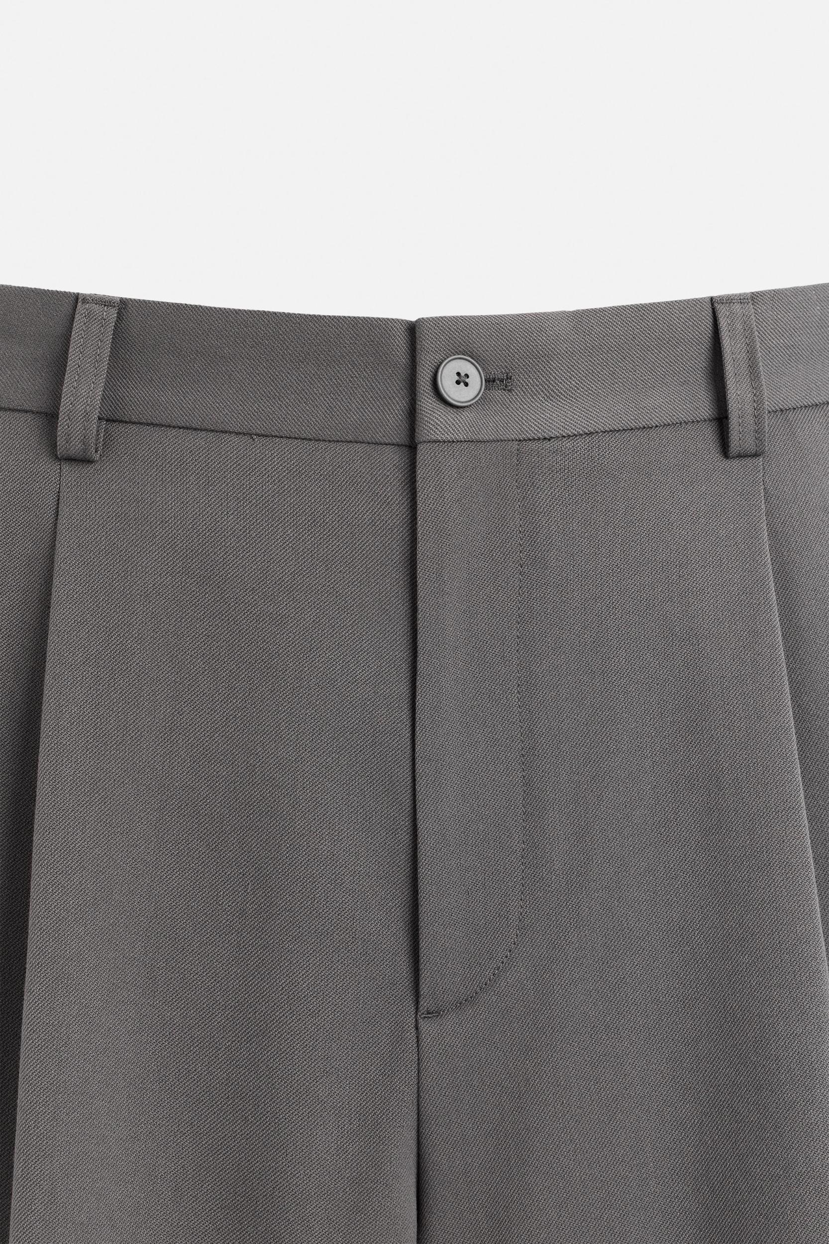 PLEATED RELAXED FIT SHORTS Product Image