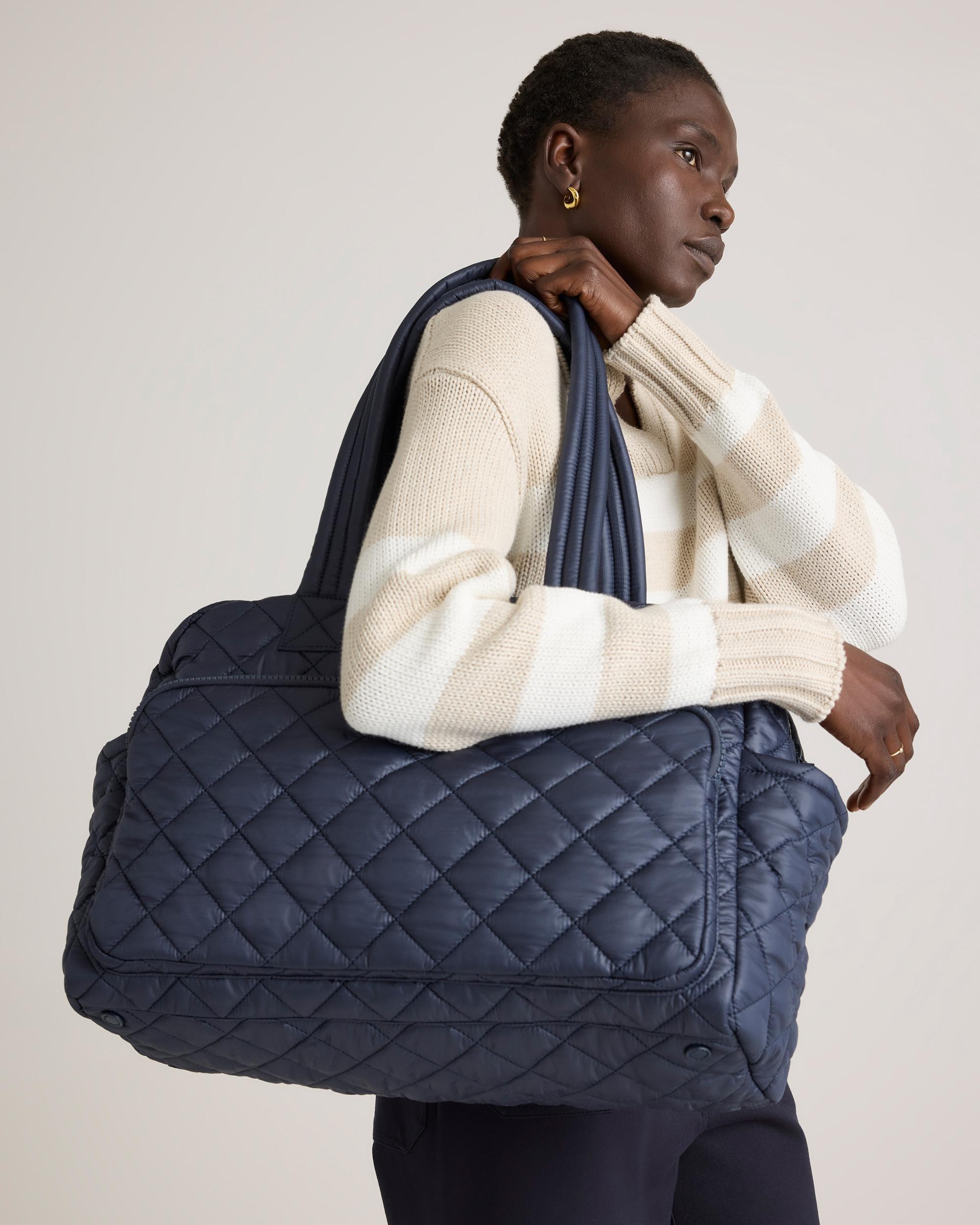 Quince | Women's Transit Quilted Duffle Bag in Navy, Nylon Product Image