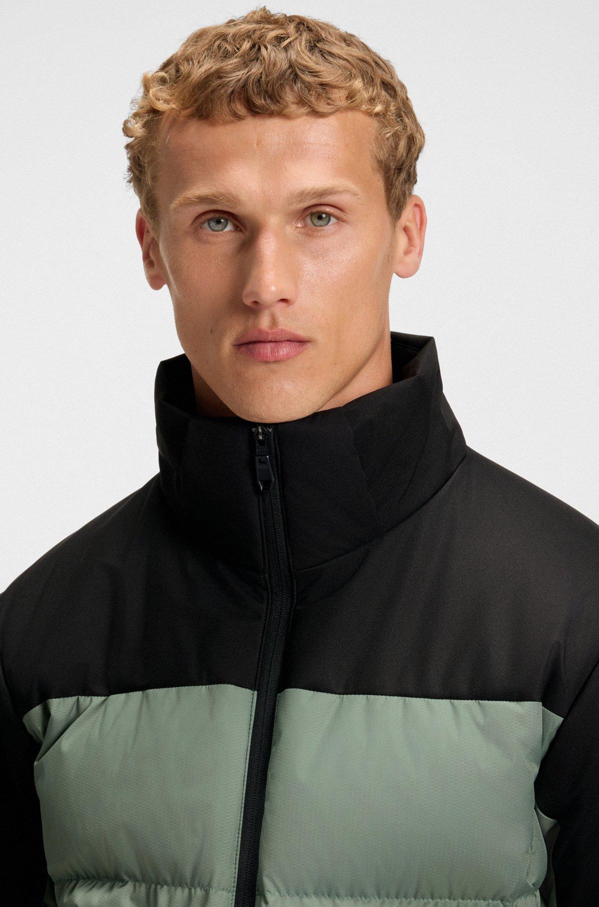 Water-repellent down jacket with detachable hood and sleeves Product Image