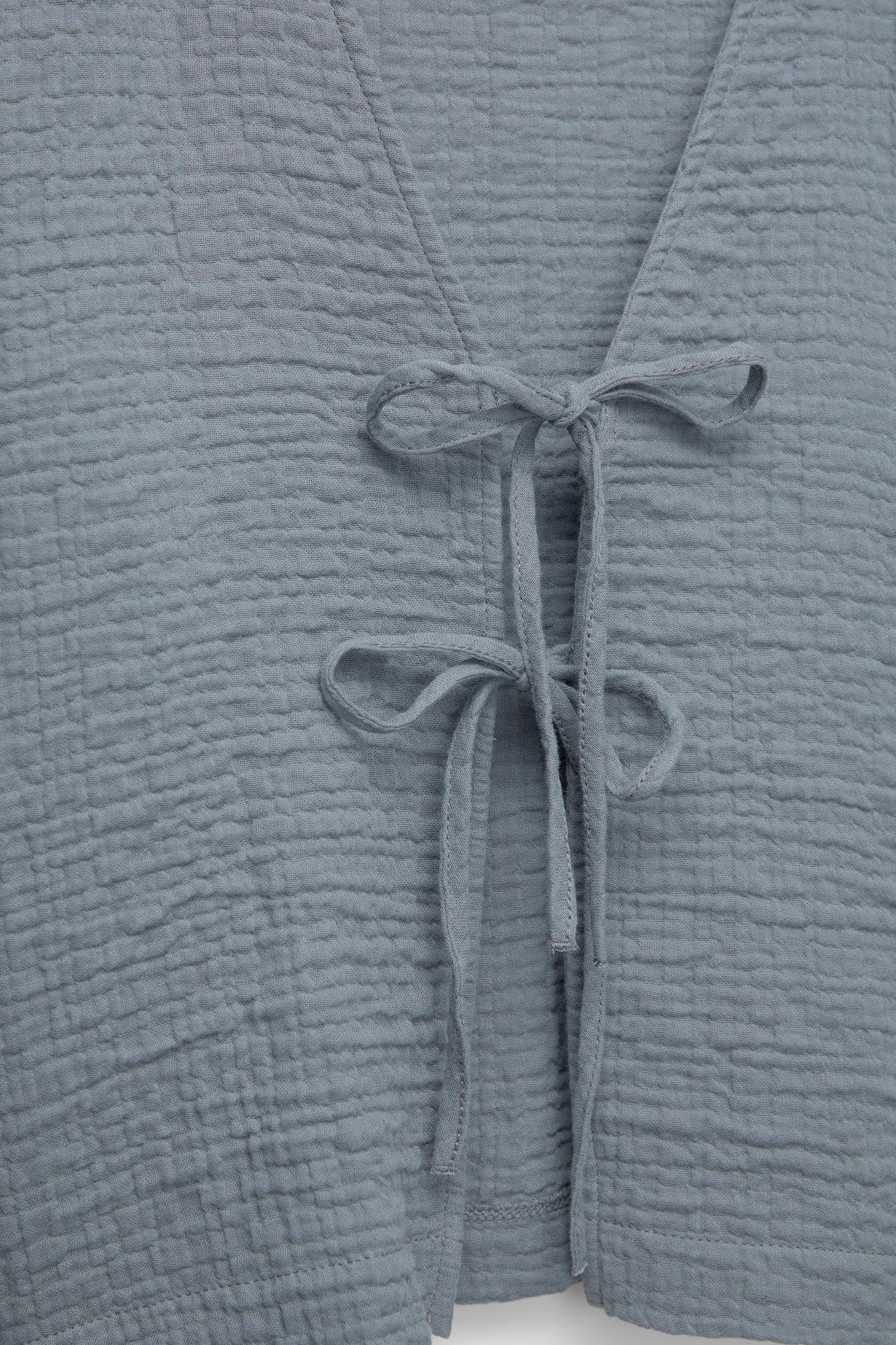 Puff sleeve blouse with ties Product Image