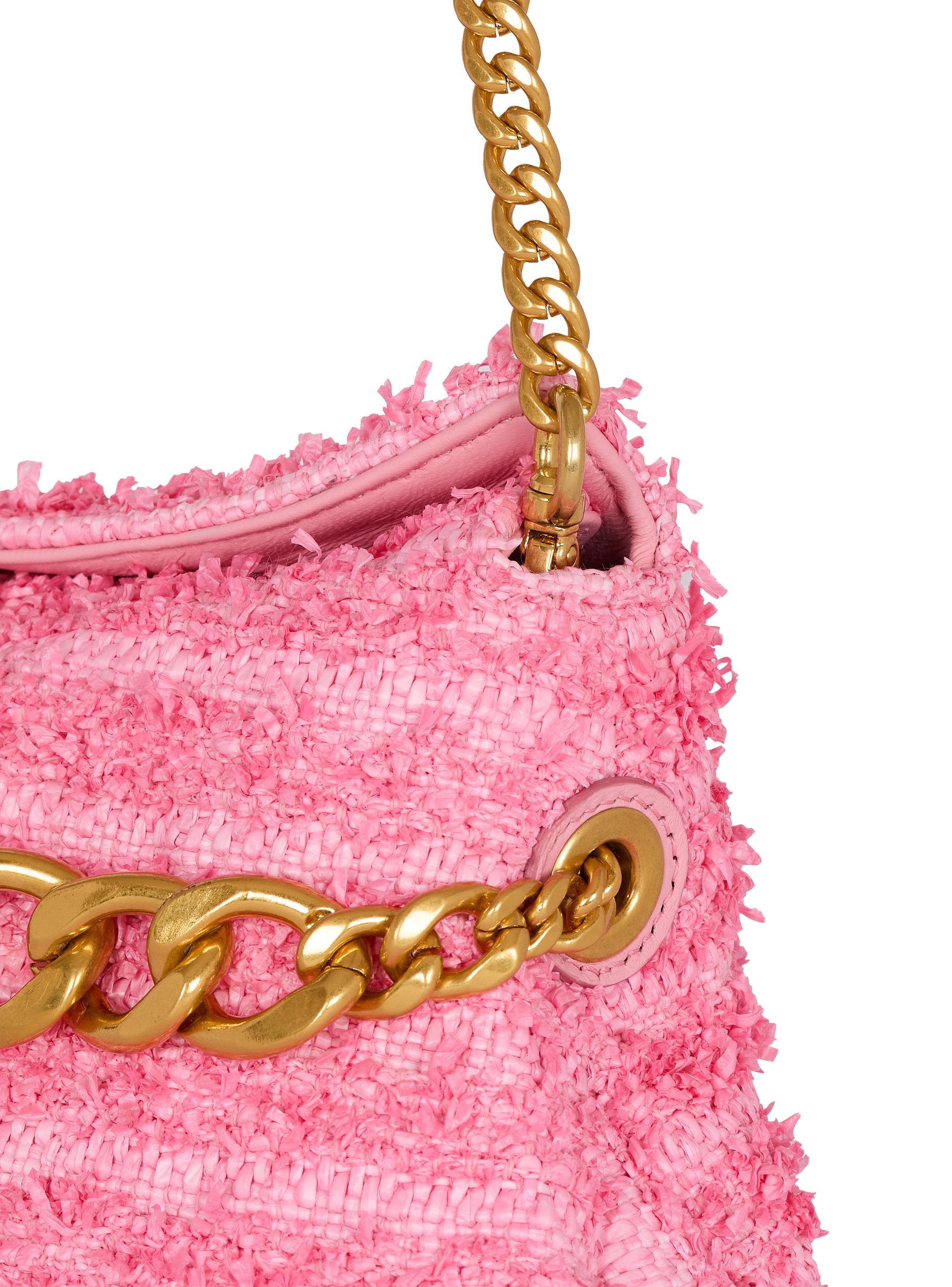 1945 Soft clutch bag in tweed-effect raffia Product Image