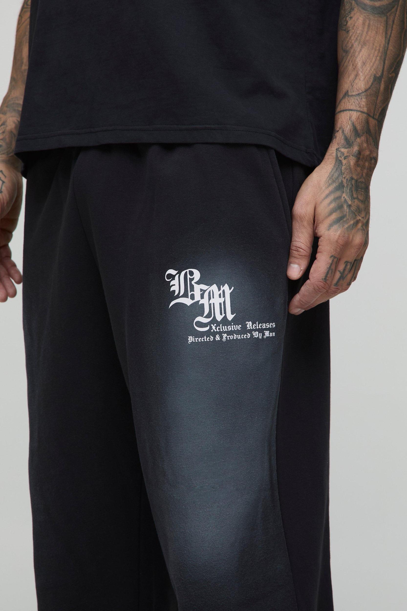 Tall Oversized Spray Wash Homme Applique Joggers | boohooMAN USA Product Image