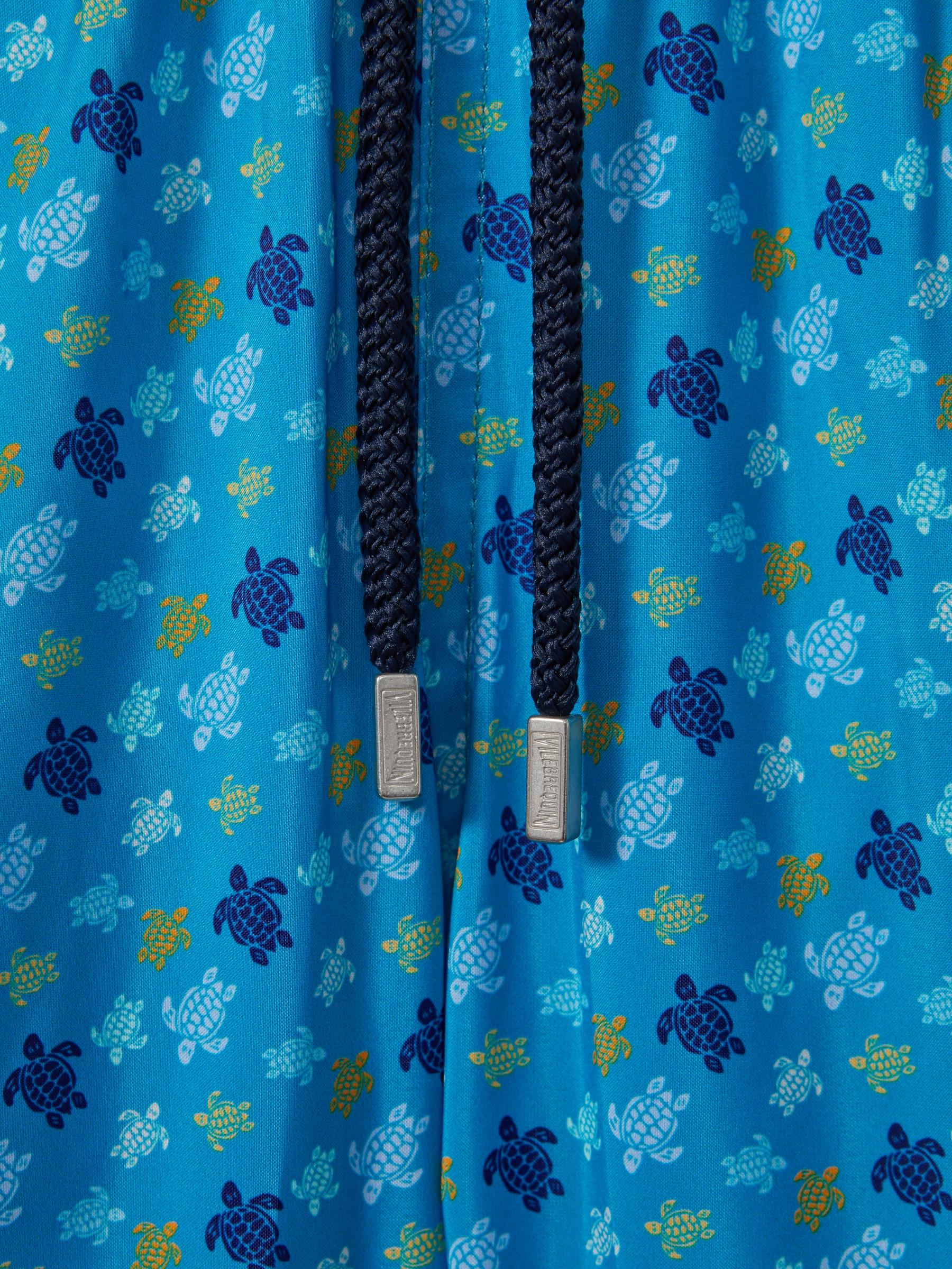 Vilebrequin Foldable Turtle Print Swim Shorts in Bleu Hawai Product Image