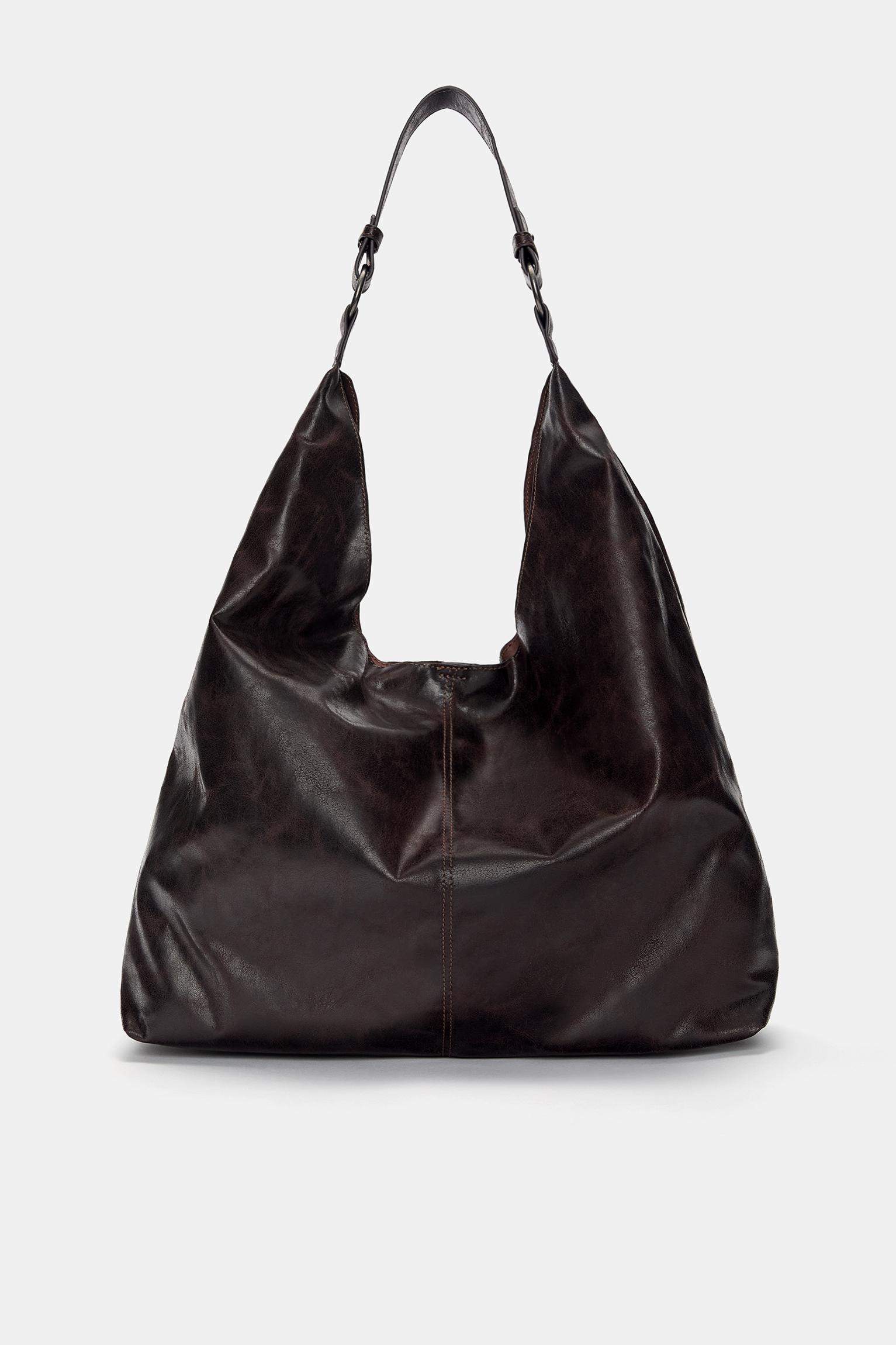 Distressed shopper bag with rings Product Image