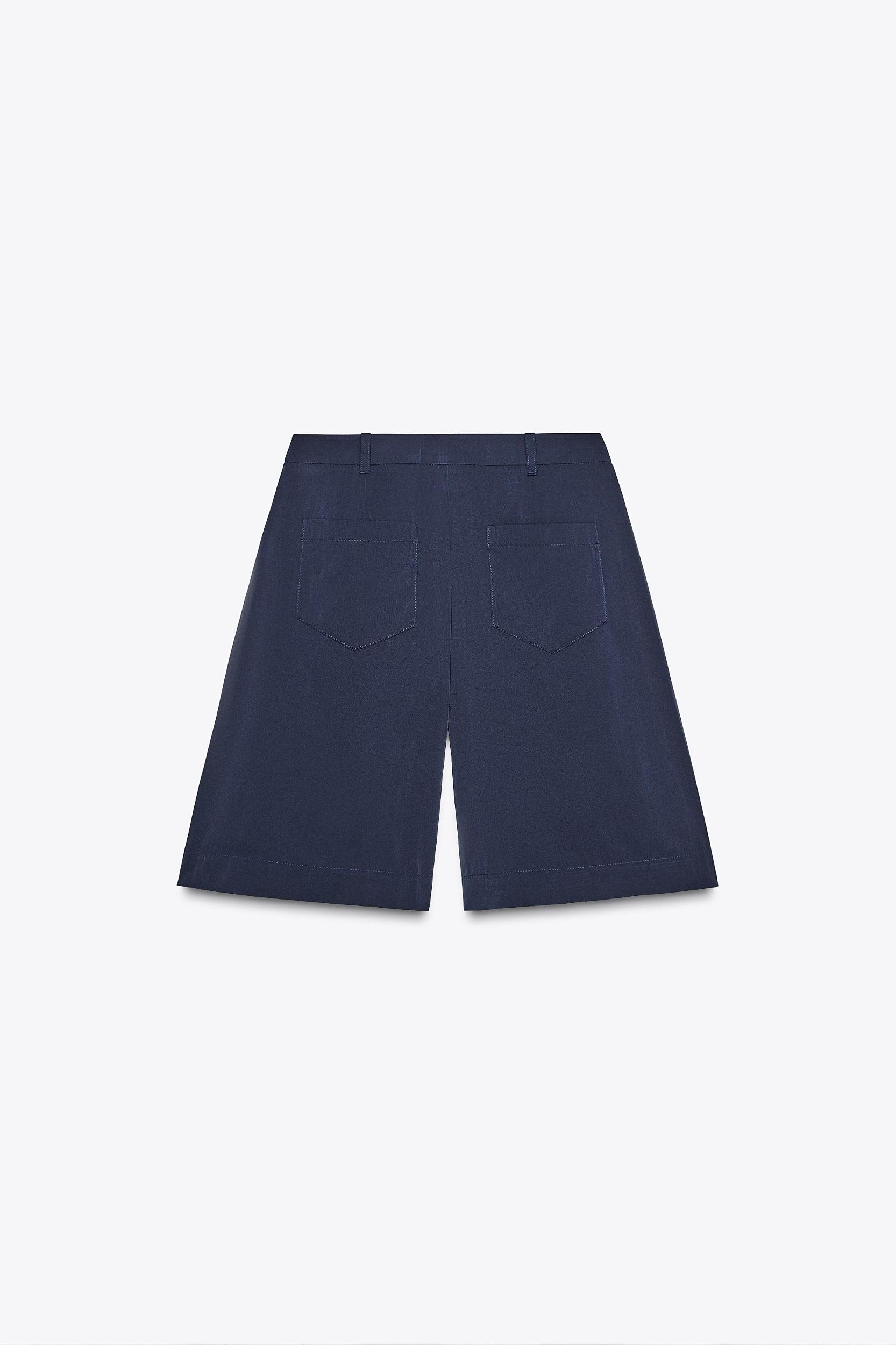 LONG PLEATED SHORTS Product Image
