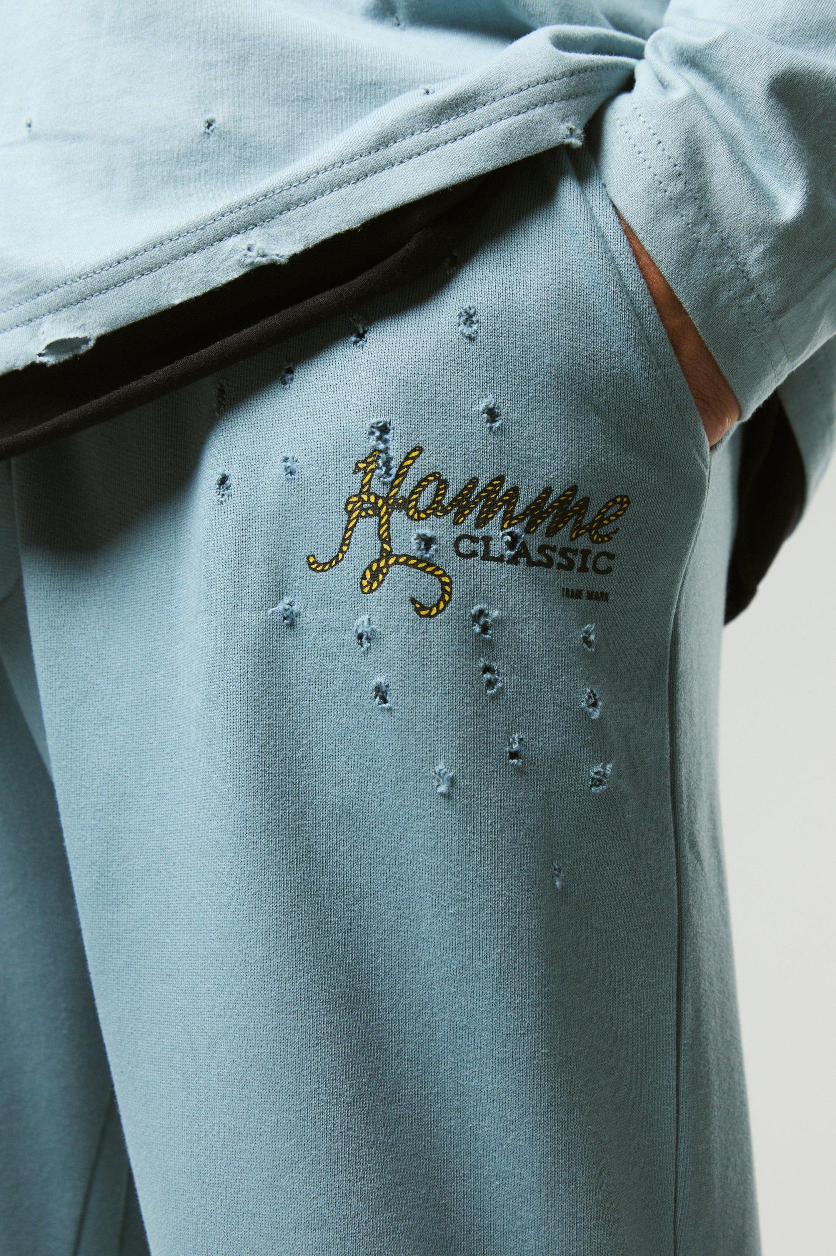 Plus Distressed Flared Sweatpants | boohooMAN USA Product Image