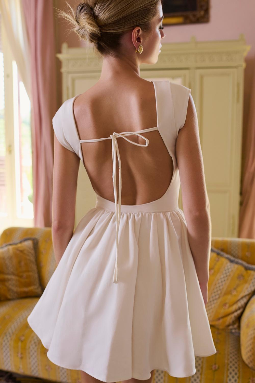 Enchant  white open back mini dress Product Image