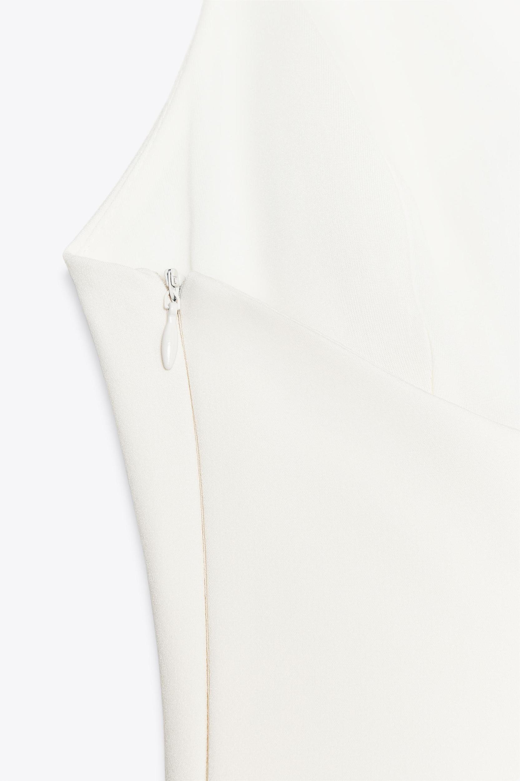 STRETCH PEPLUM TOP Product Image