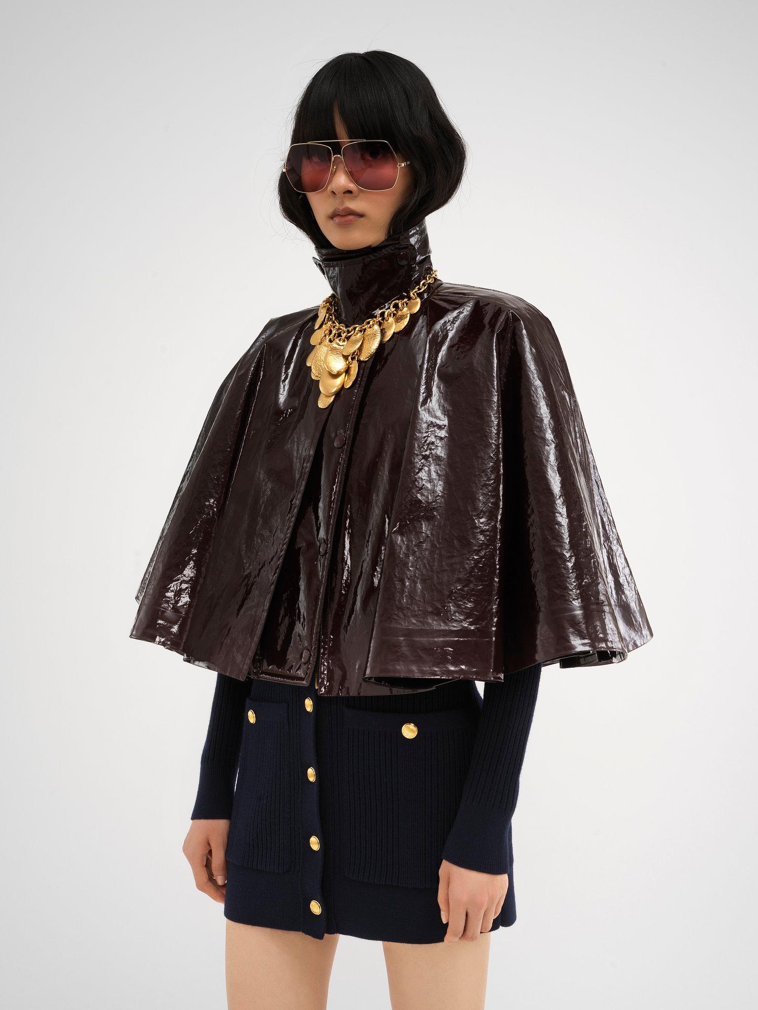 Short cape in lacquered shiny cotton Product Image