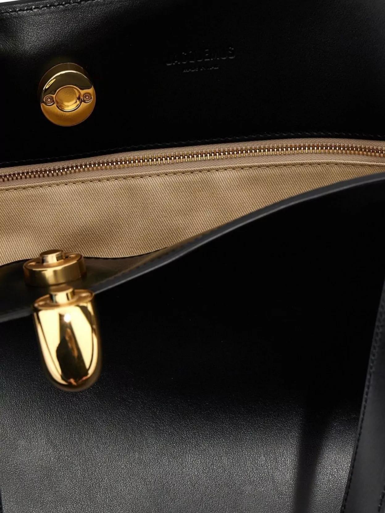 JACQUEMUS The Medium Bambola Asymmetric Leather Bucket Bag In Black 990 Product Image