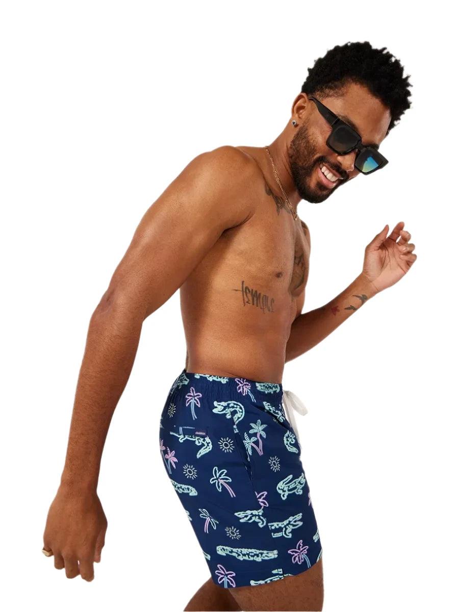 Chubbies The Neon Glades 5.5" Inseam Polyester/Spandex Swim Trunks with Mesh Brief Liner in Navy Blue Product Image