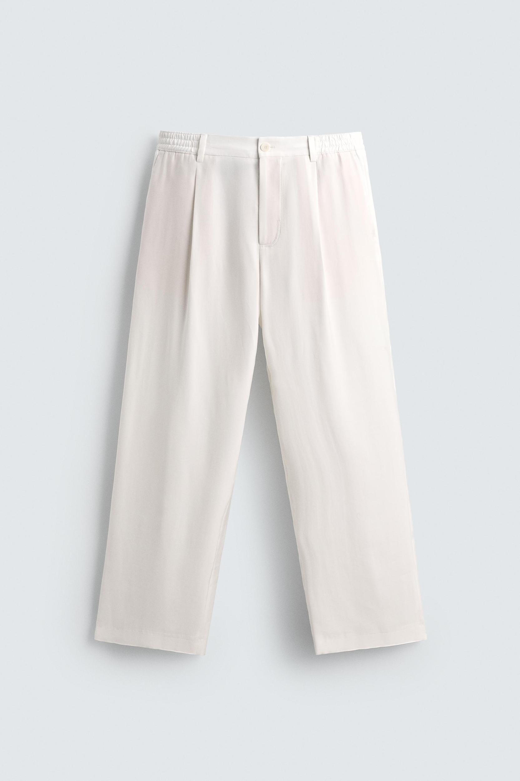 RELAXED FIT PLEATED PANTS Product Image