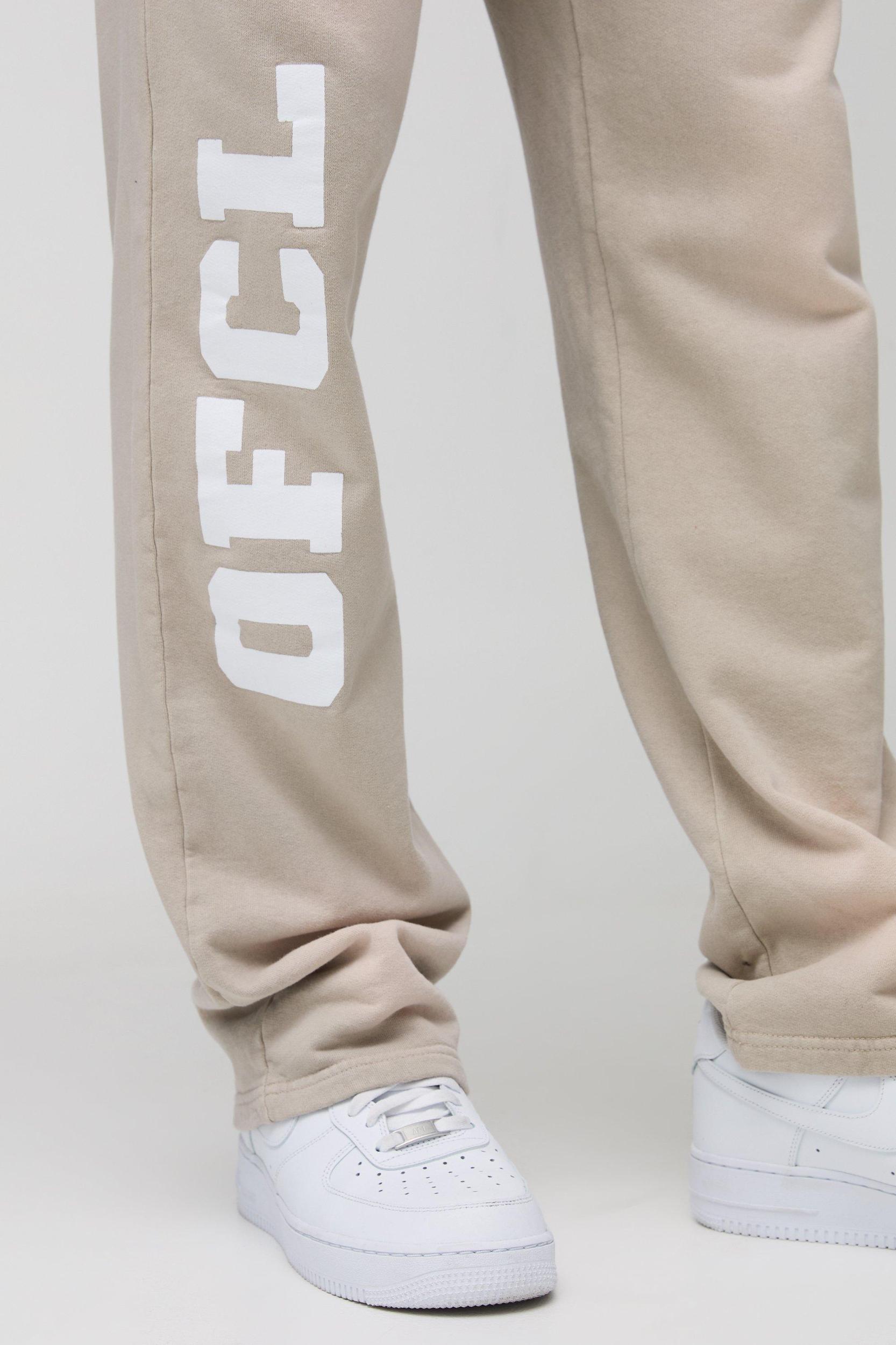 Relaxed Fit Spray Wash Ofcl Printed Sweatpants | boohooMAN USA Product Image
