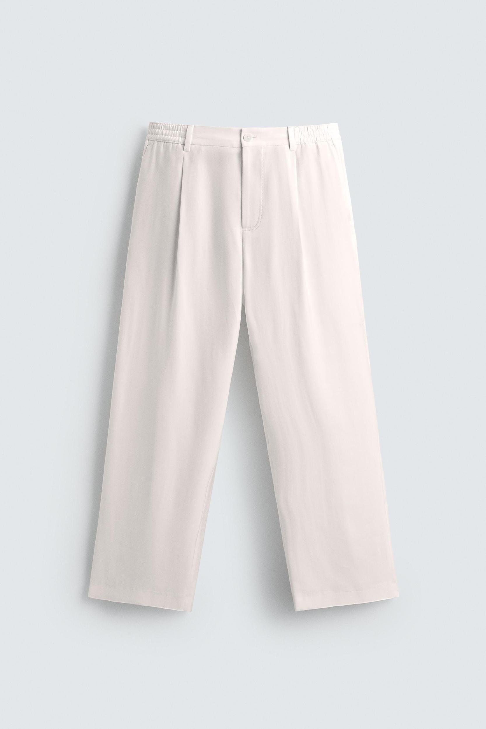 RELAXED FIT PLEATED PANTS Product Image