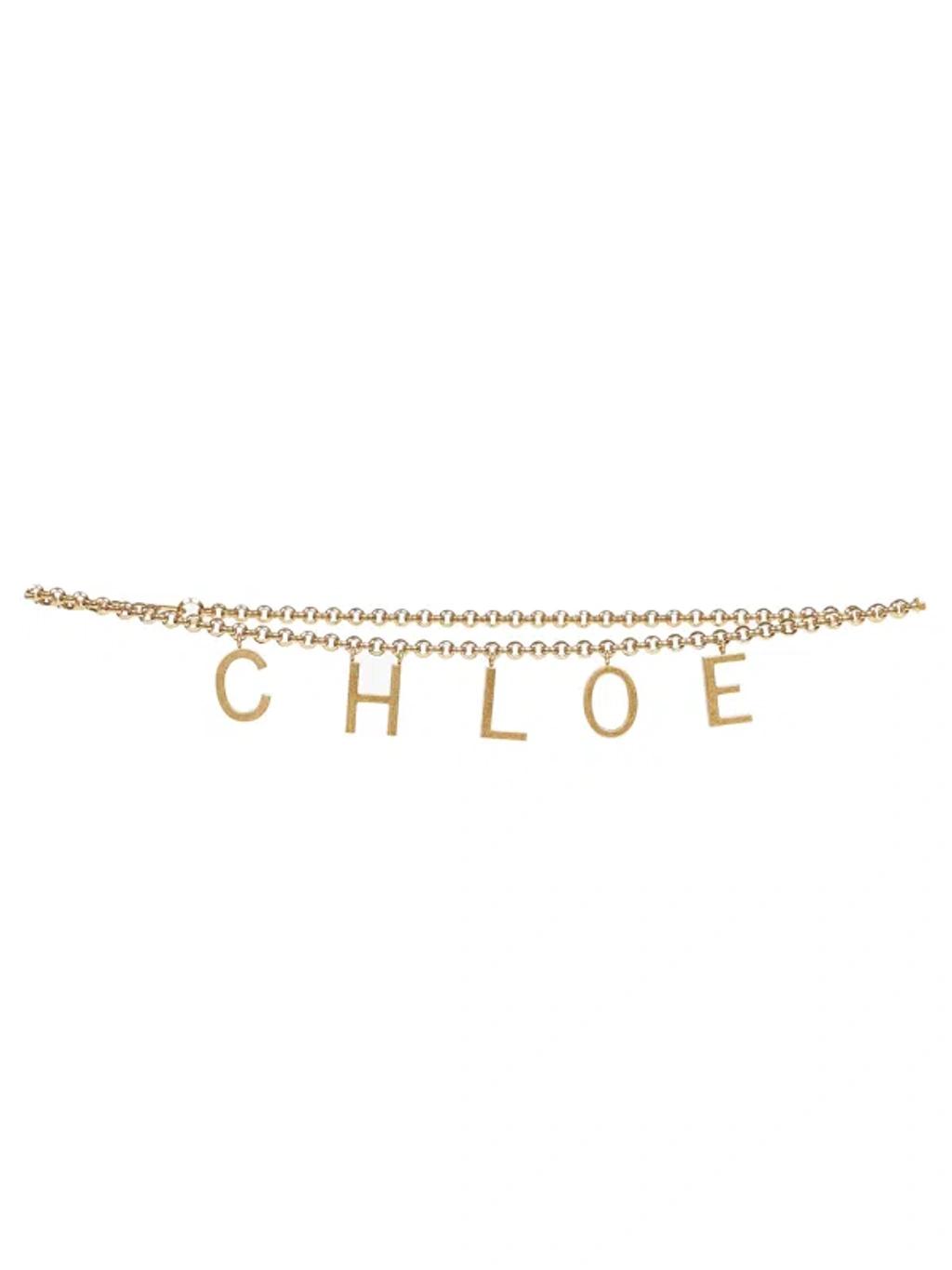 CHLOÉ Metallic Belt With Adjustable Hook Closure And Logo Lettering Charm In Brass Woman In Gold Product Image