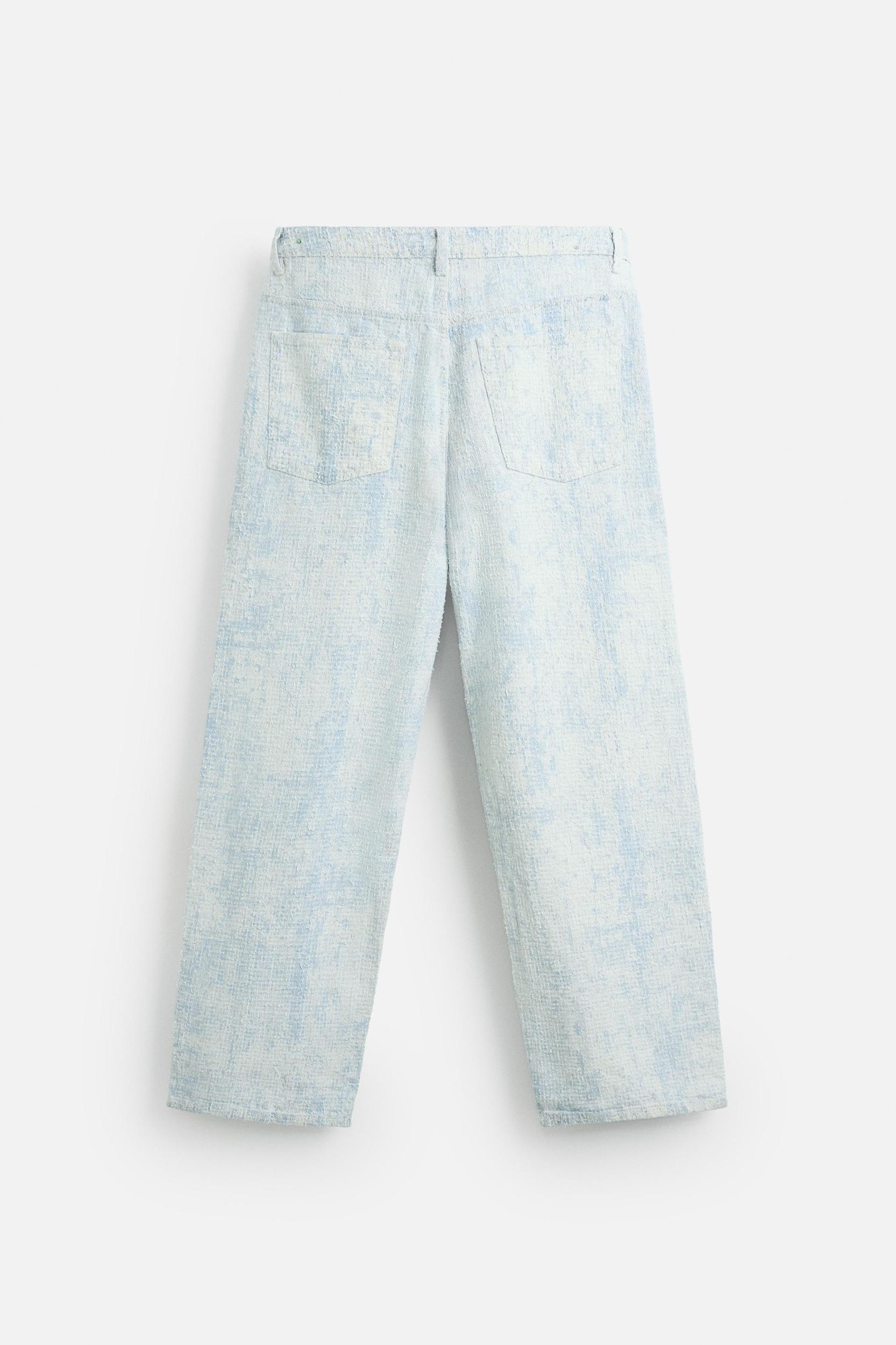 DISTRESSED FINISH BAGGY FIT JEANS Product Image