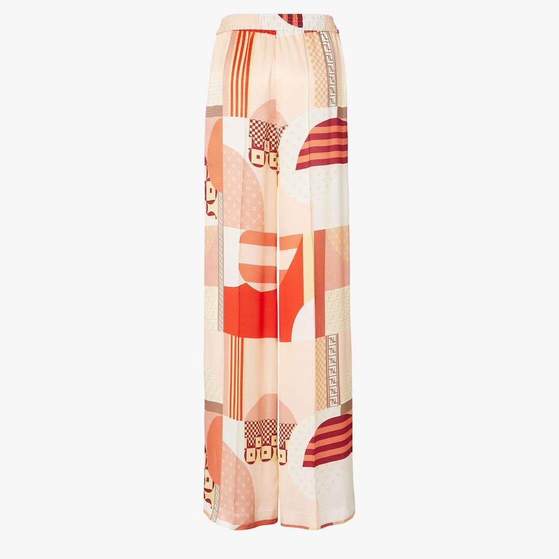 PantsPink silk pants with patchwork print Product Image