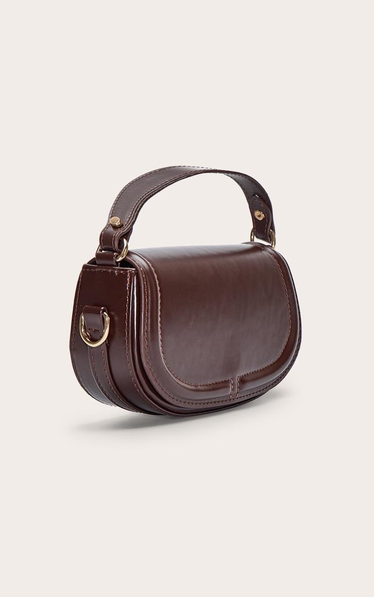 Chocolate Mini Round Cross Body Bag Product Image