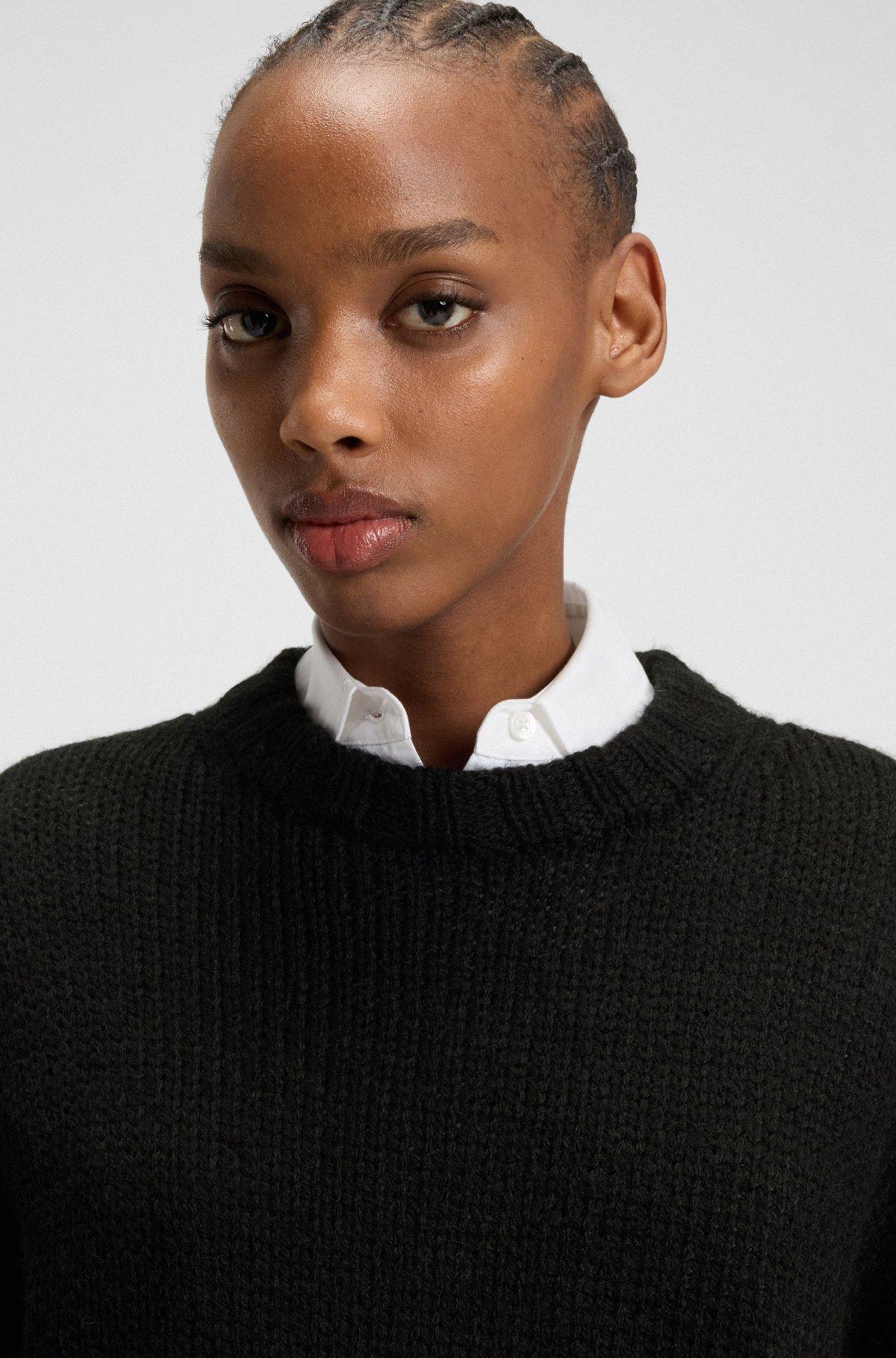 Oversize-fit knitted sweater with embroidered logo Product Image